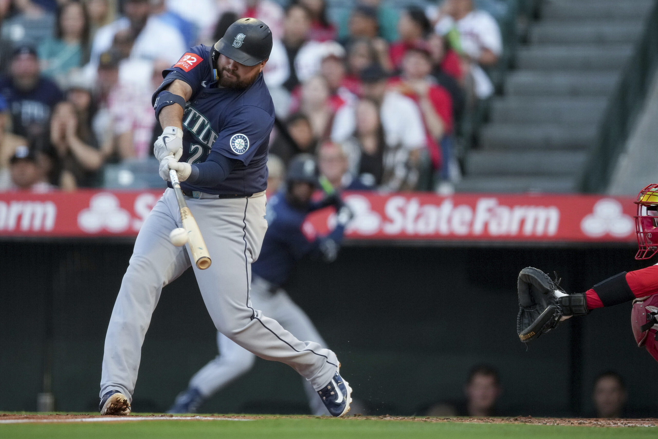 The Seattle Mariners’ Rowdy Tellez makes contact with the ball...