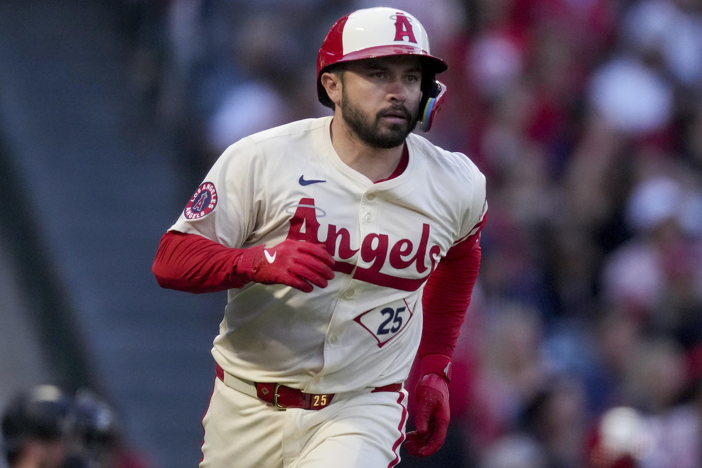The Angels’ Travis d’Arnaud runs the bases after hitting a...