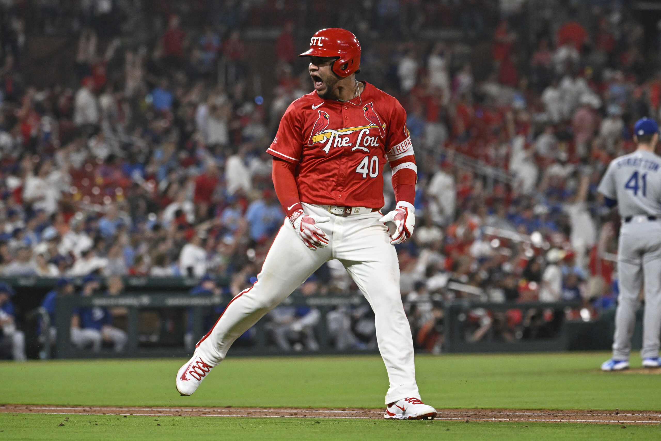 The St. Louis Cardinals’ Willson Contreras celebrates after hitting a...