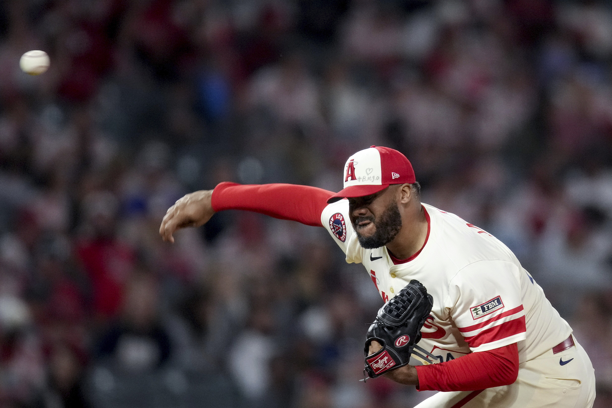 Angels relief pitcher Kenley Jansen delivers during the ninth inning...
