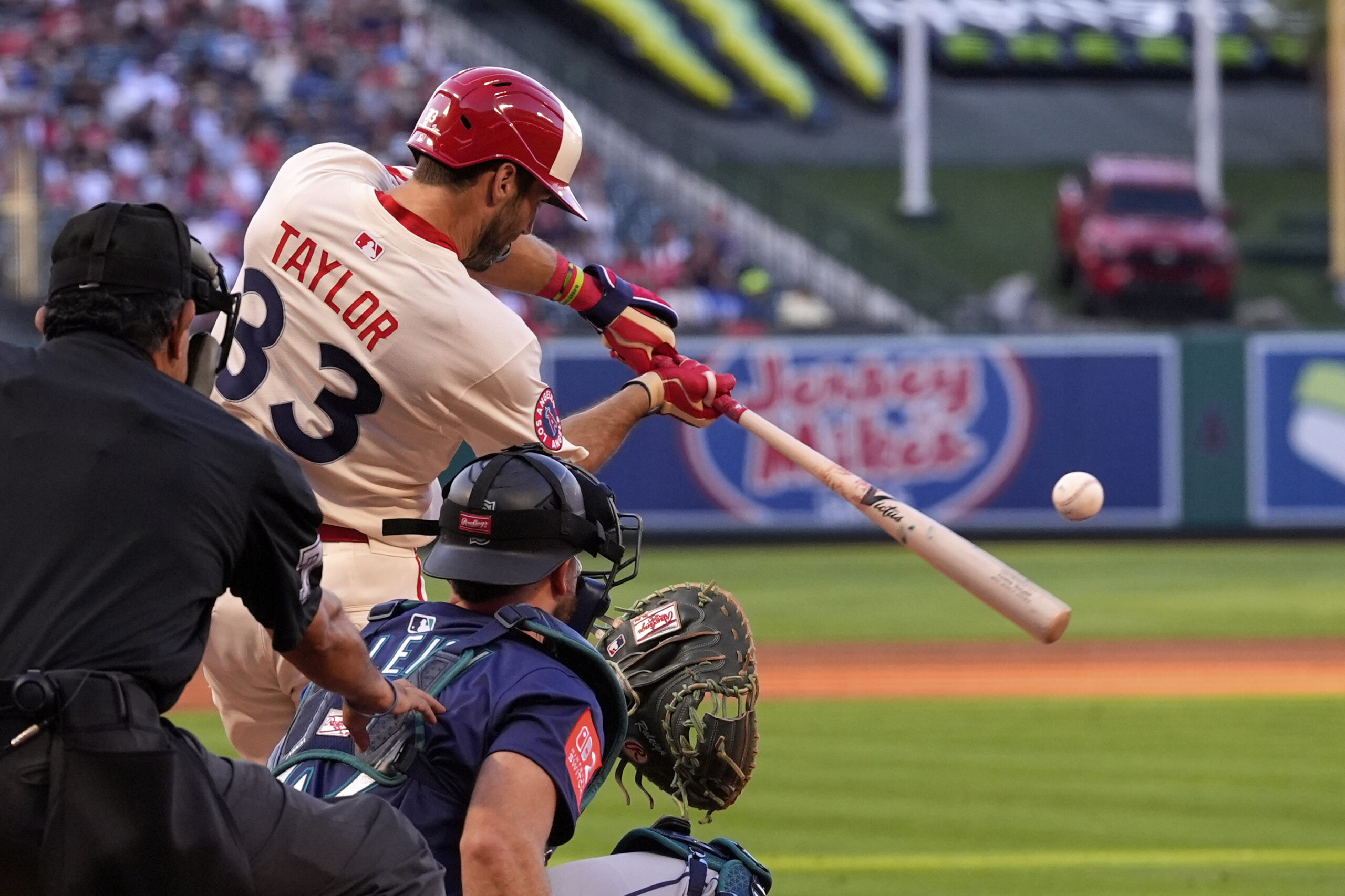 Angels’ Chris Taylor hits a solo home run as Seattle...