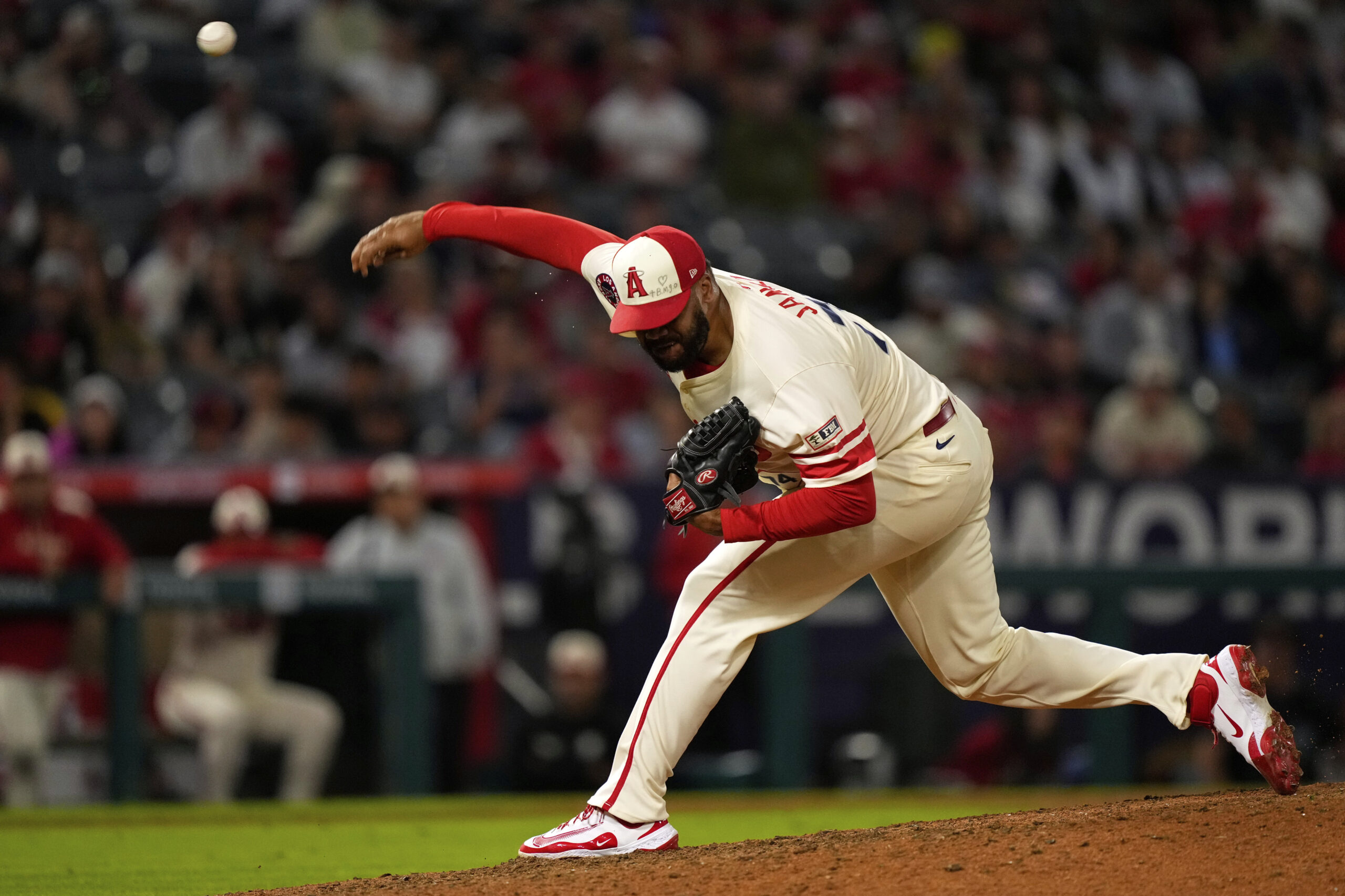 Angels relief pitcher Kenley Jansen throws to the plate during...