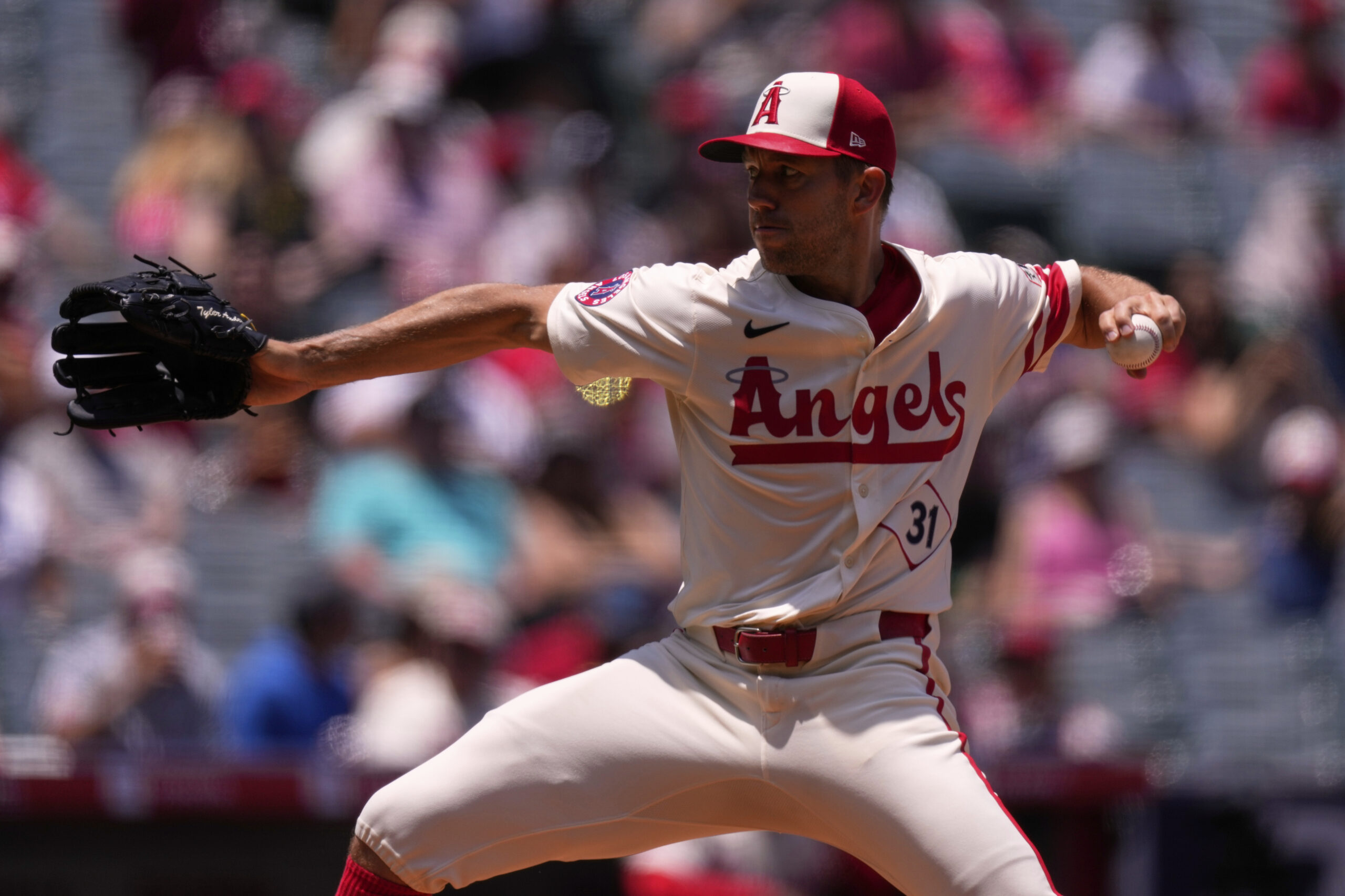 Angels starting pitcher Tyler Anderson throws to the plate during...