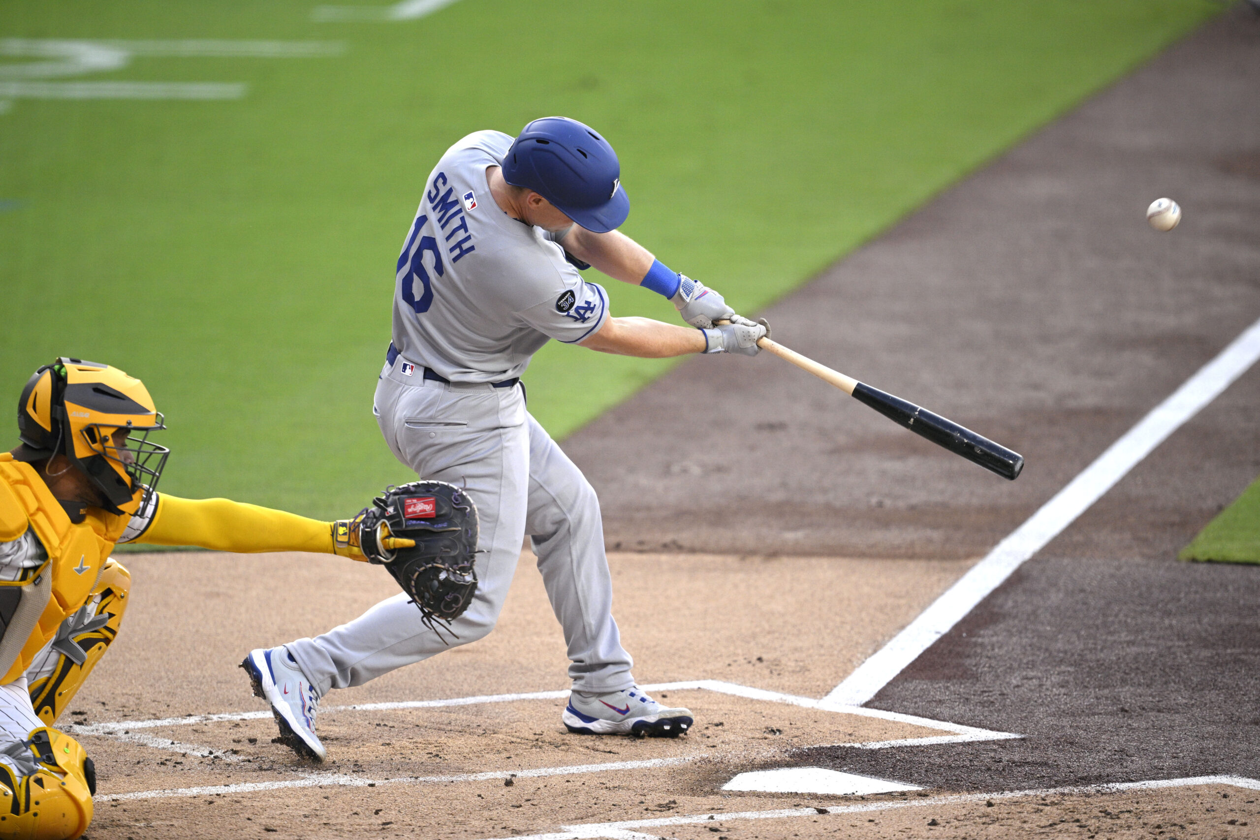 The Dodgers’ Will Smith hits a sacrifice fly against the...
