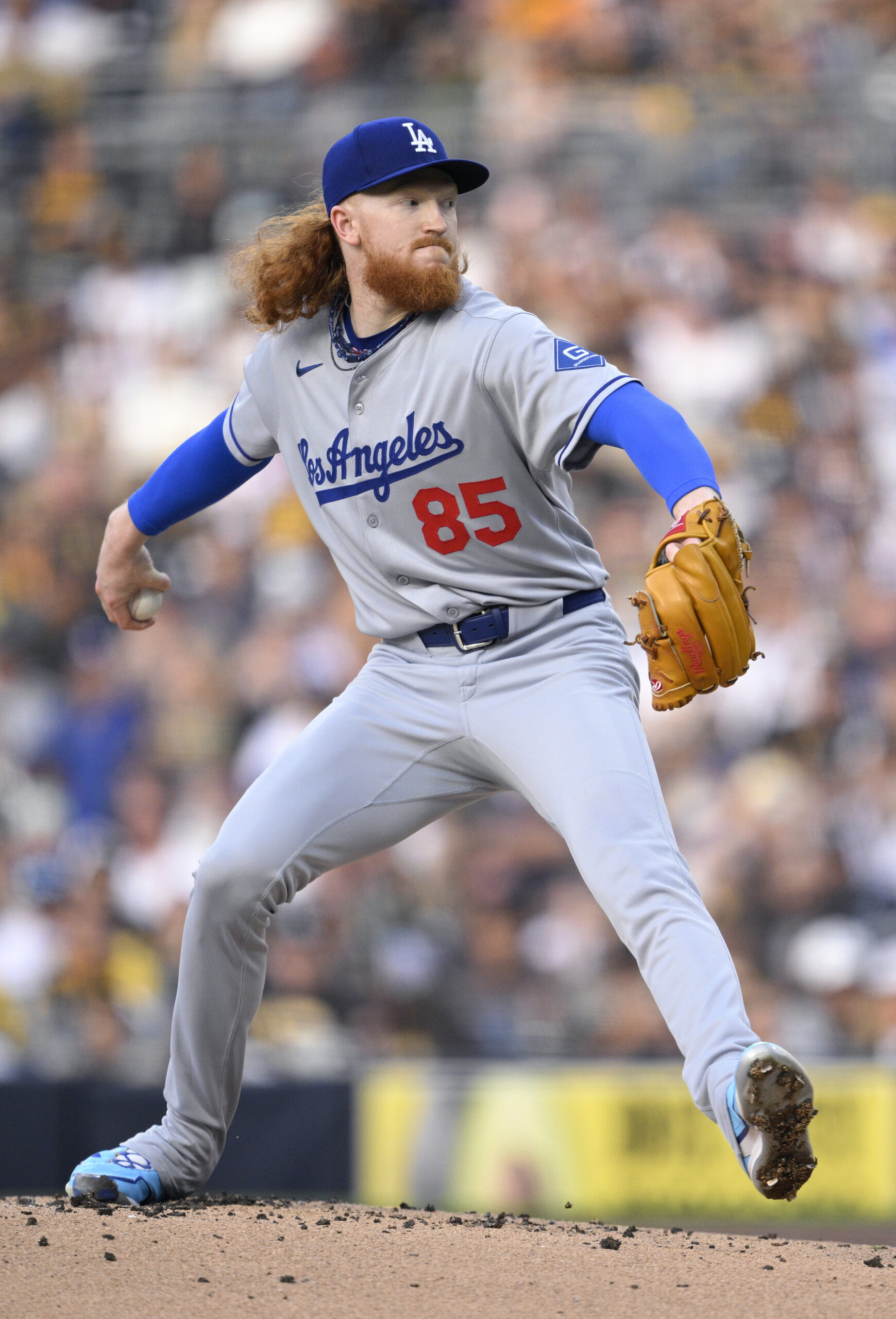 Dodgers starting pitcher Dustin May throws to the plate against...