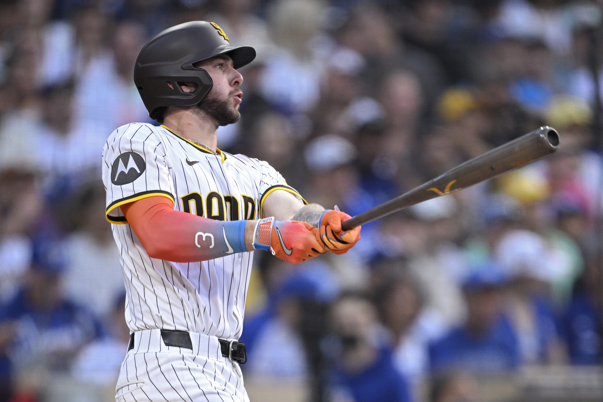 The San Diego Padres’ Jackson Merrill hits a sacrifice fly...