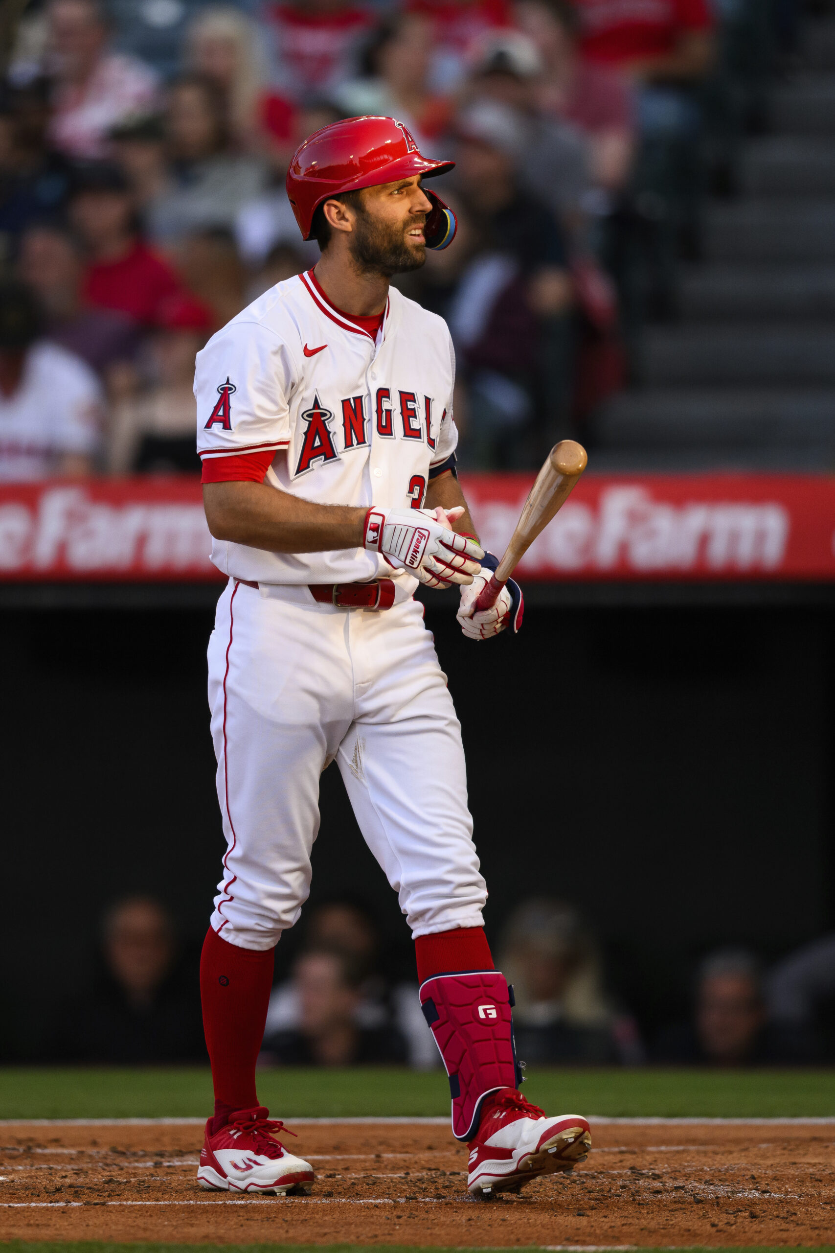 The Angels’ Chris Taylor reacts after striking out during the...