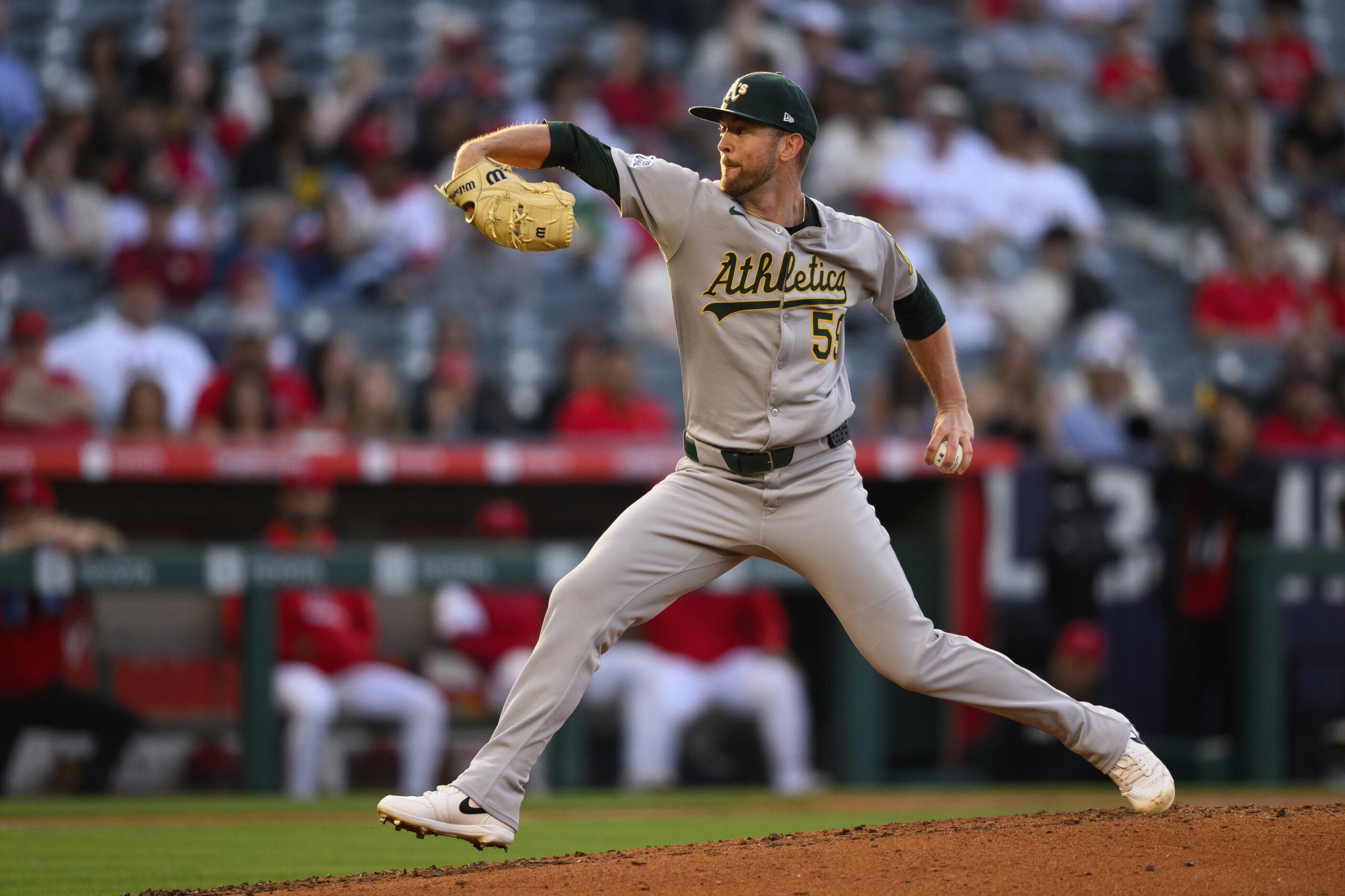 Athletics relief pitcher Jeffrey Springs delivers a pitch during the...