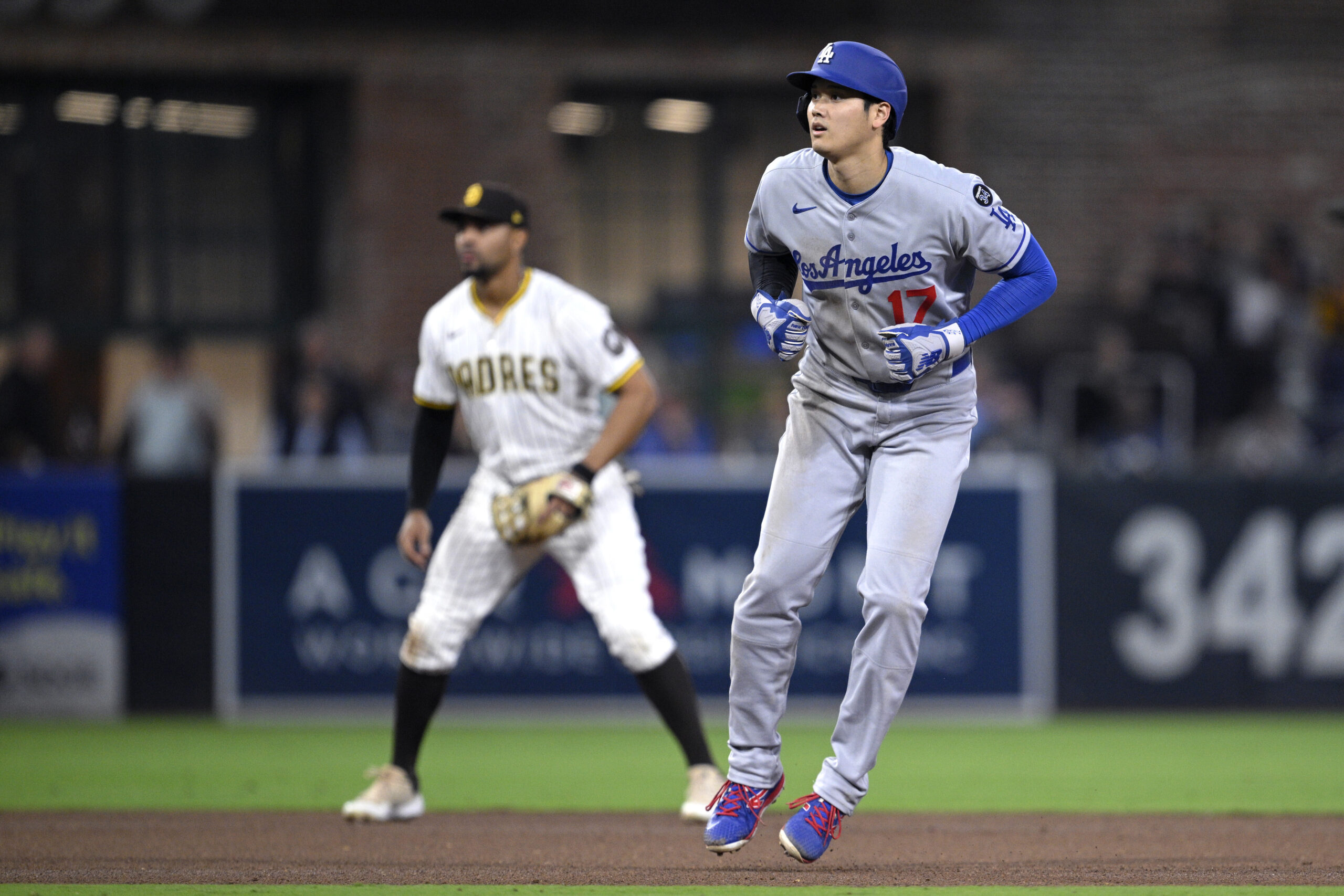 Dodgers star Shohei Ohtani leads off second base during the...