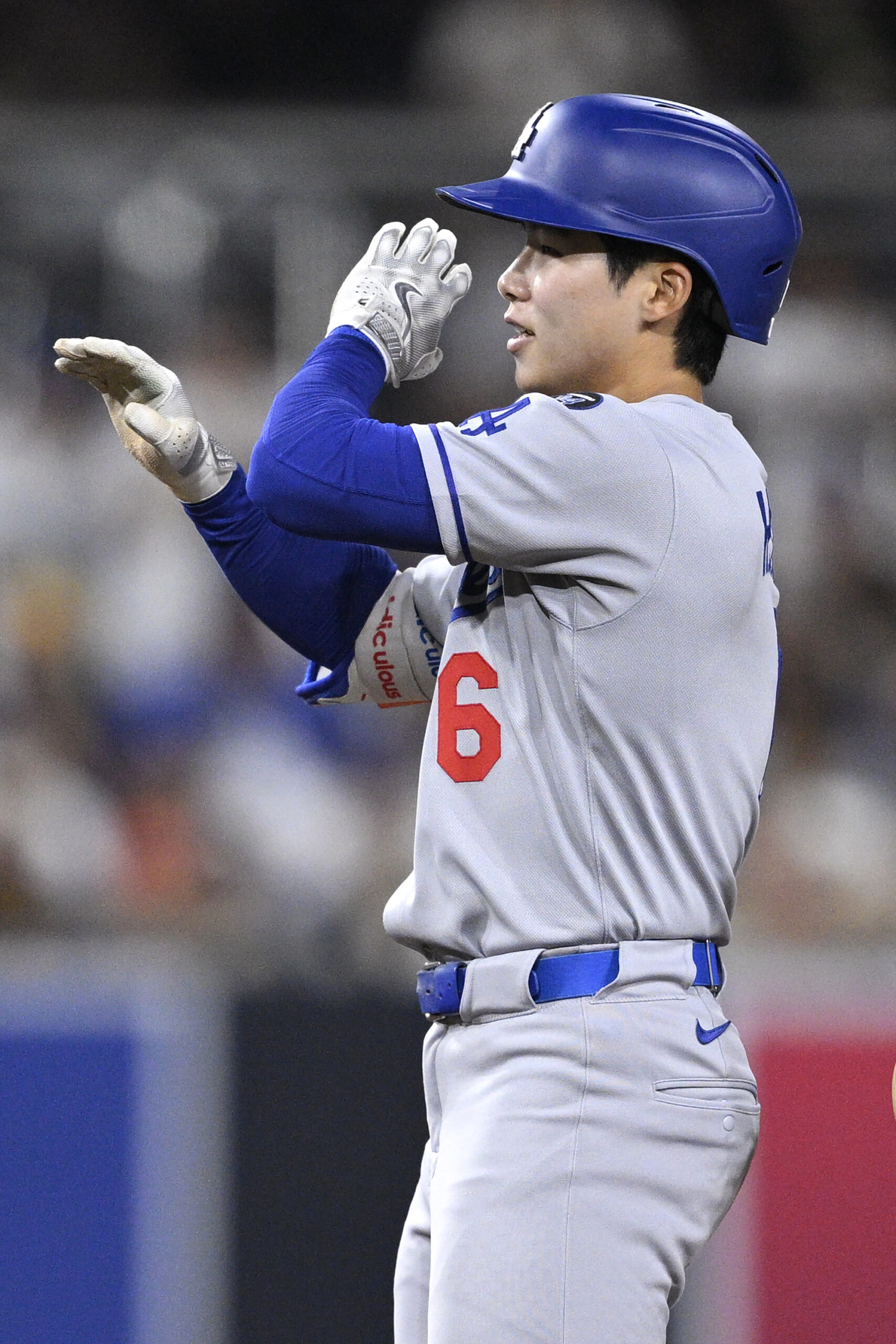 The Dodgers’ Hyeseong Kim celebrates after hitting an RBI double...