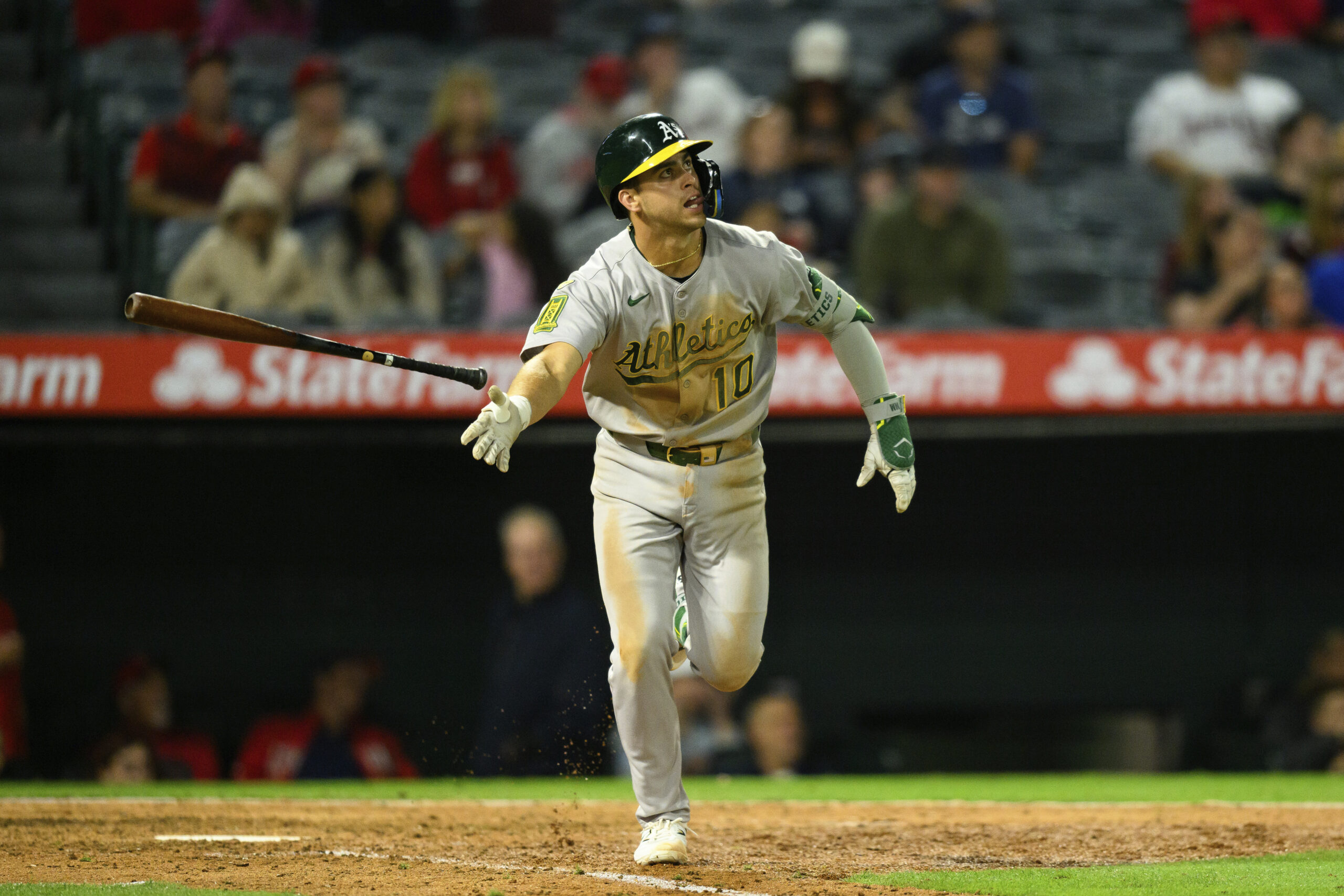 The Athletics’ Max Muncy looks on after hitting a home...