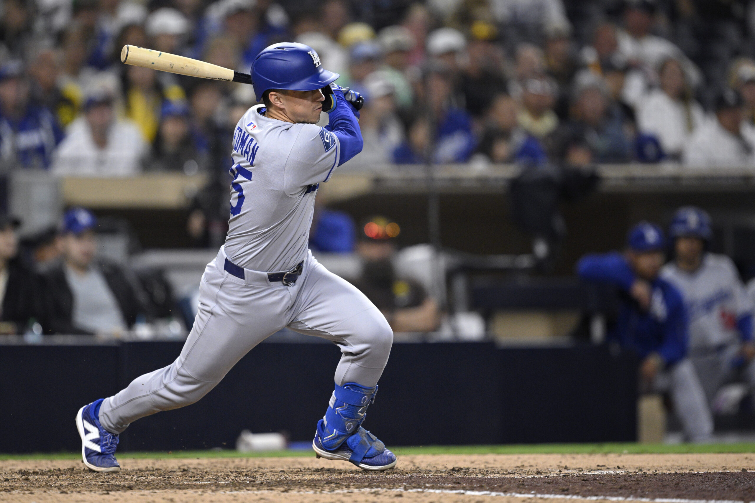 The Dodgers’ Tommy Edman hits an RBI single against the...