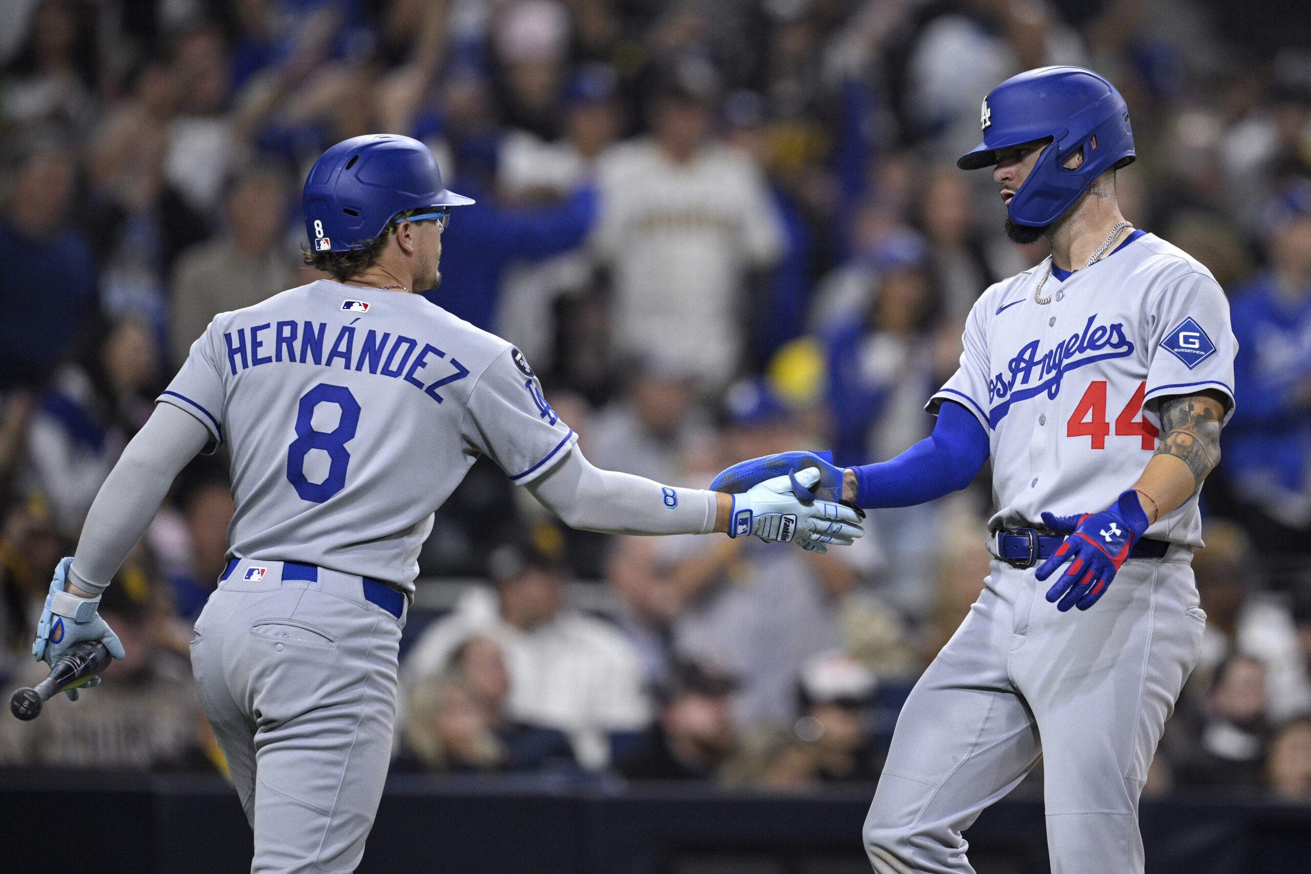 The Dodgers’ Andy Pages, right, is congratulated by teammate Kike...