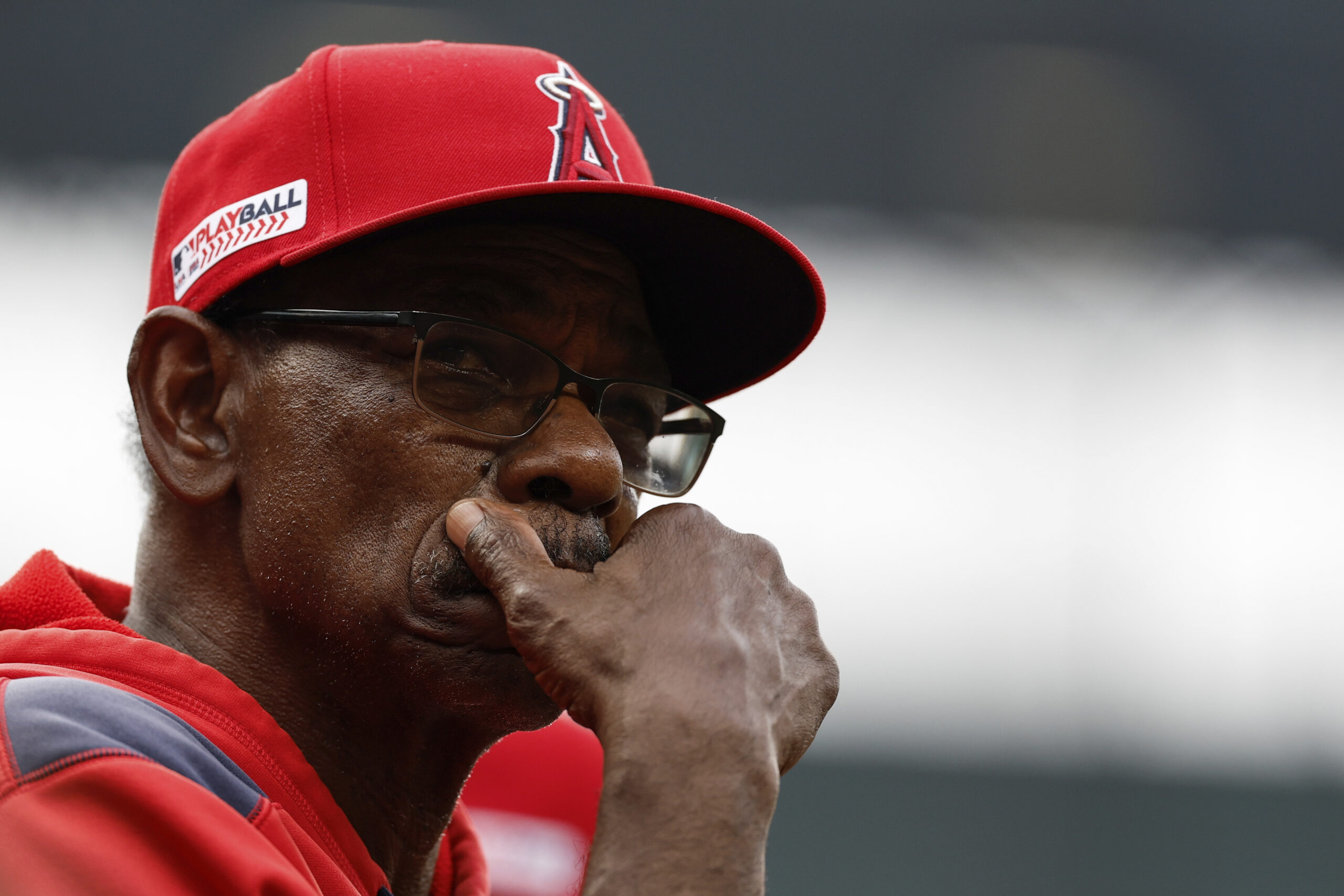 Angels manager Ron Washington looks on from the dugout during...