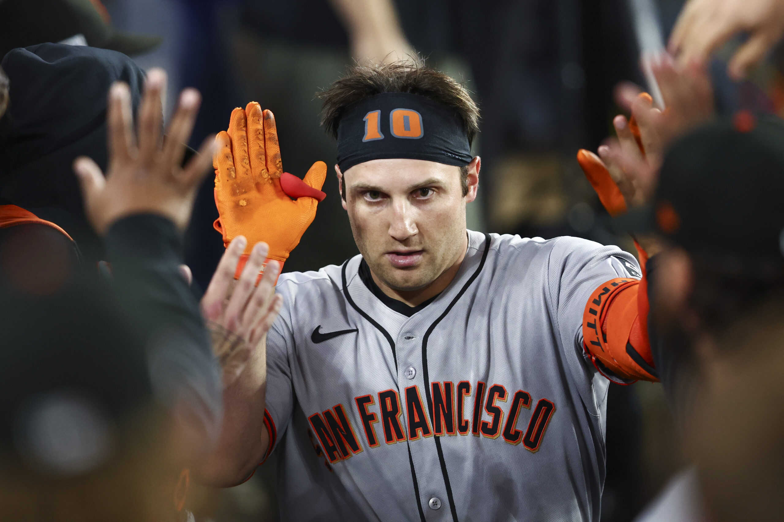 San Francisco Giants’ Casey Schmitt celebrates in the dugout after...