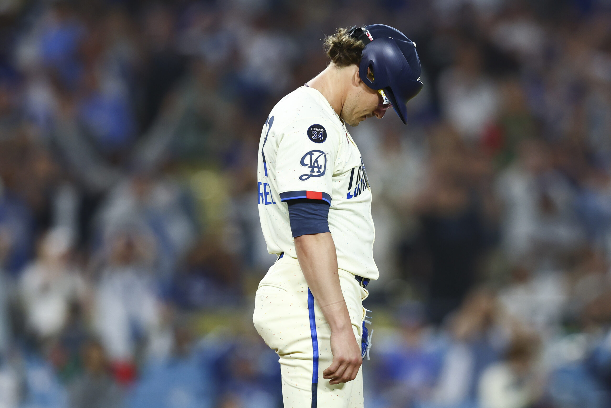 Dodgers pitcher Enrique Hernández reacts during the ninth inning of...