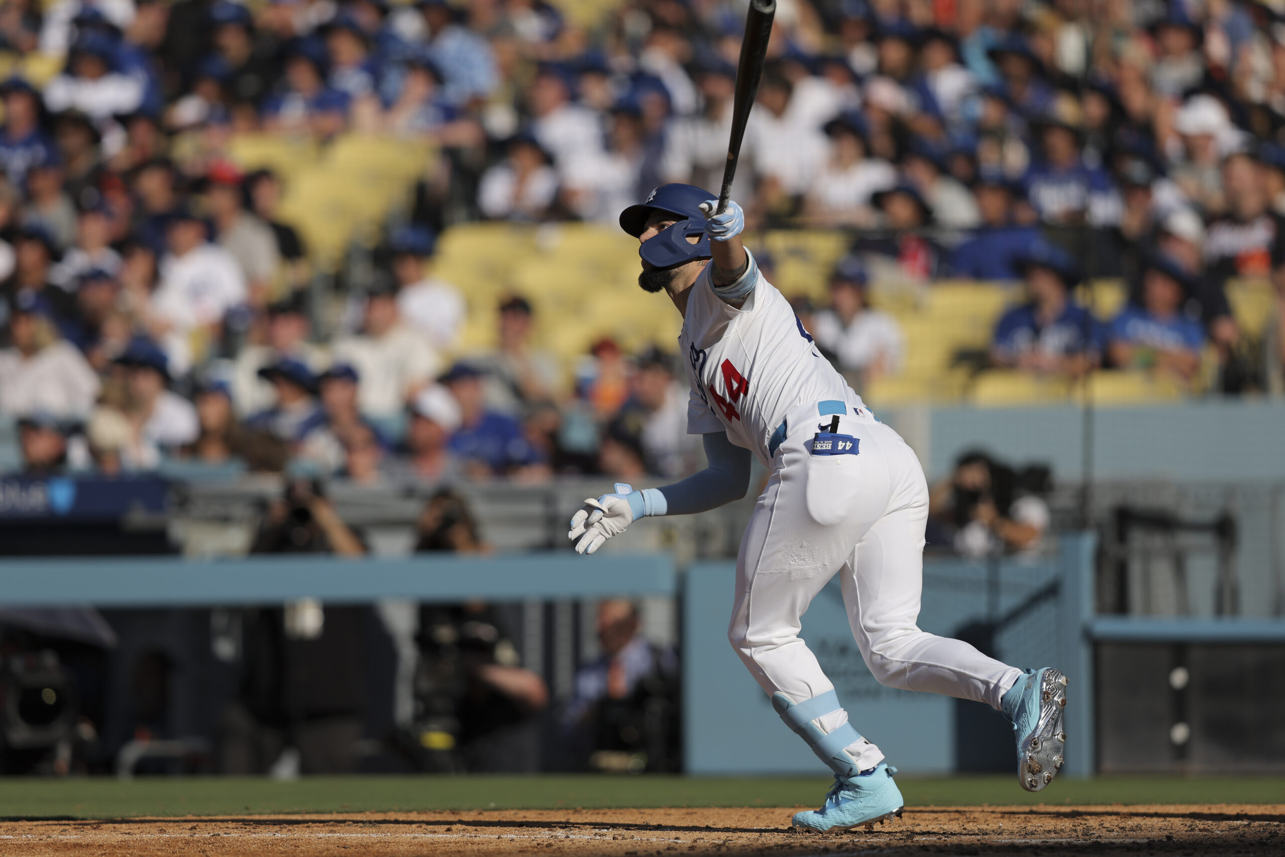 Dodgers’ Andy Pages follows through on a home run during...