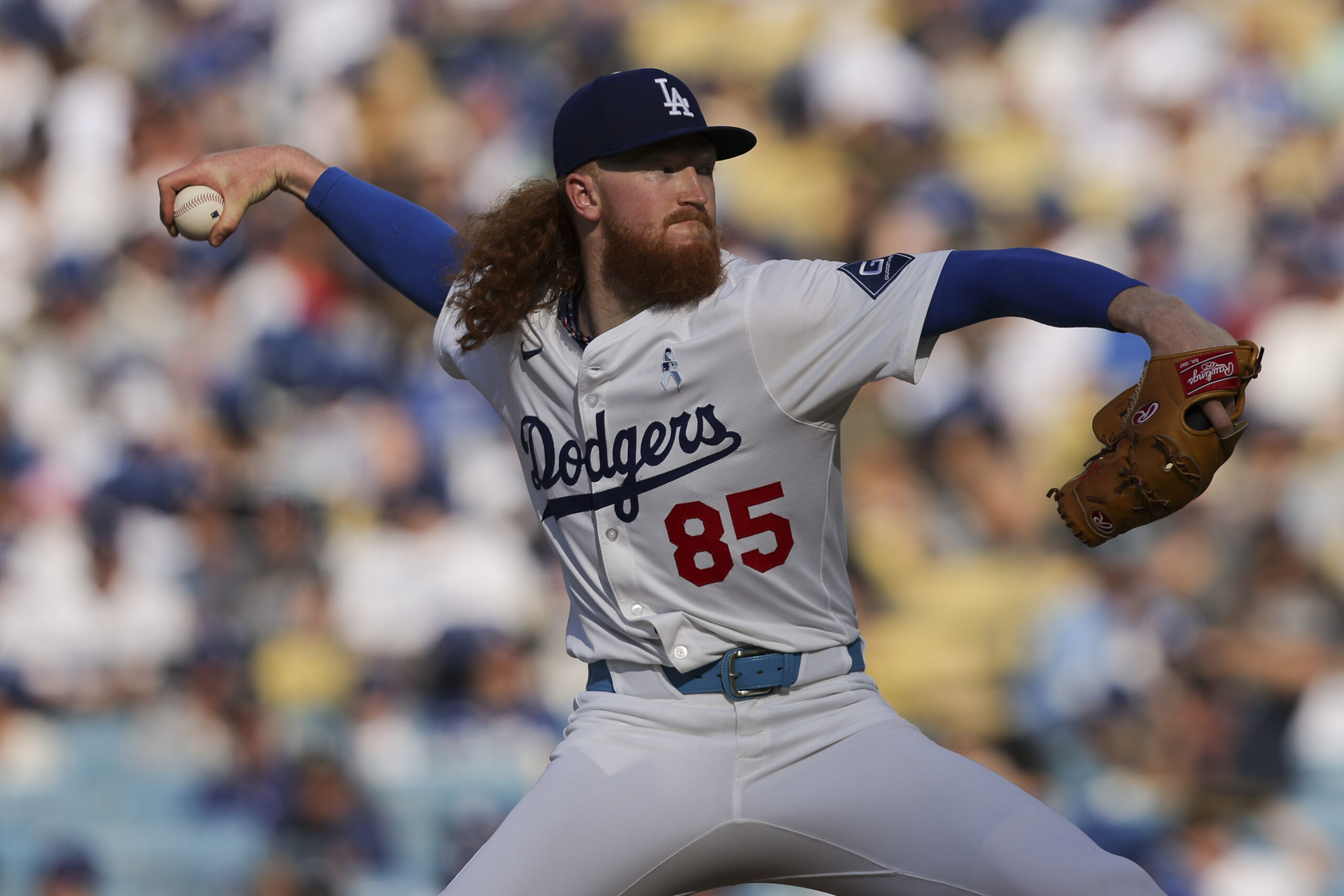 Dodgers pitcher Dustin May throws to a San Francisco Giants...