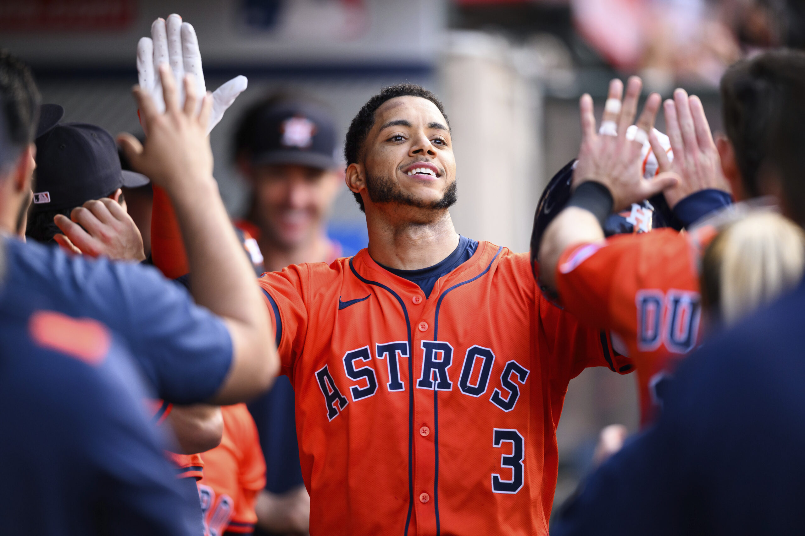 The Houston Astros’ Jeremy Peña celebrates with teammates in the...