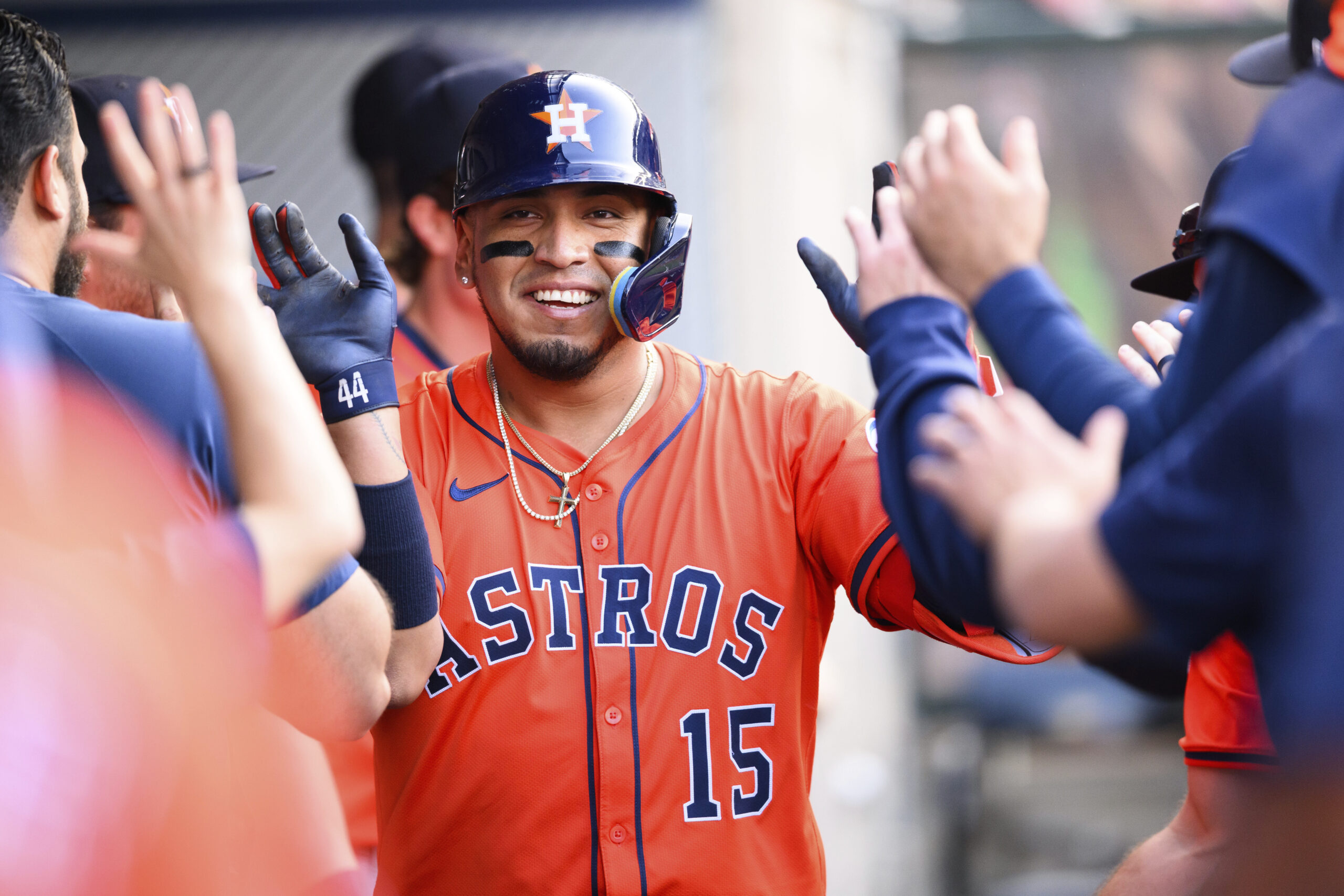 The Houston Astros’ Isaac Paredes celebrates with teammates in the...
