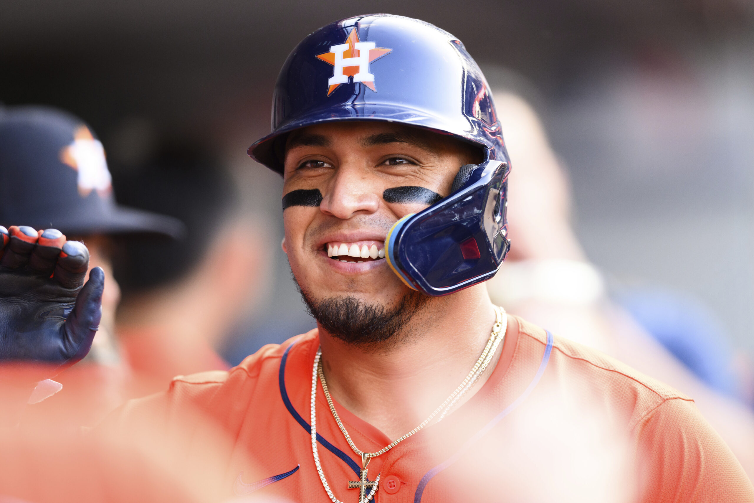 The Houston Astros’ Isaac Paredes celebrates with teammates in the...
