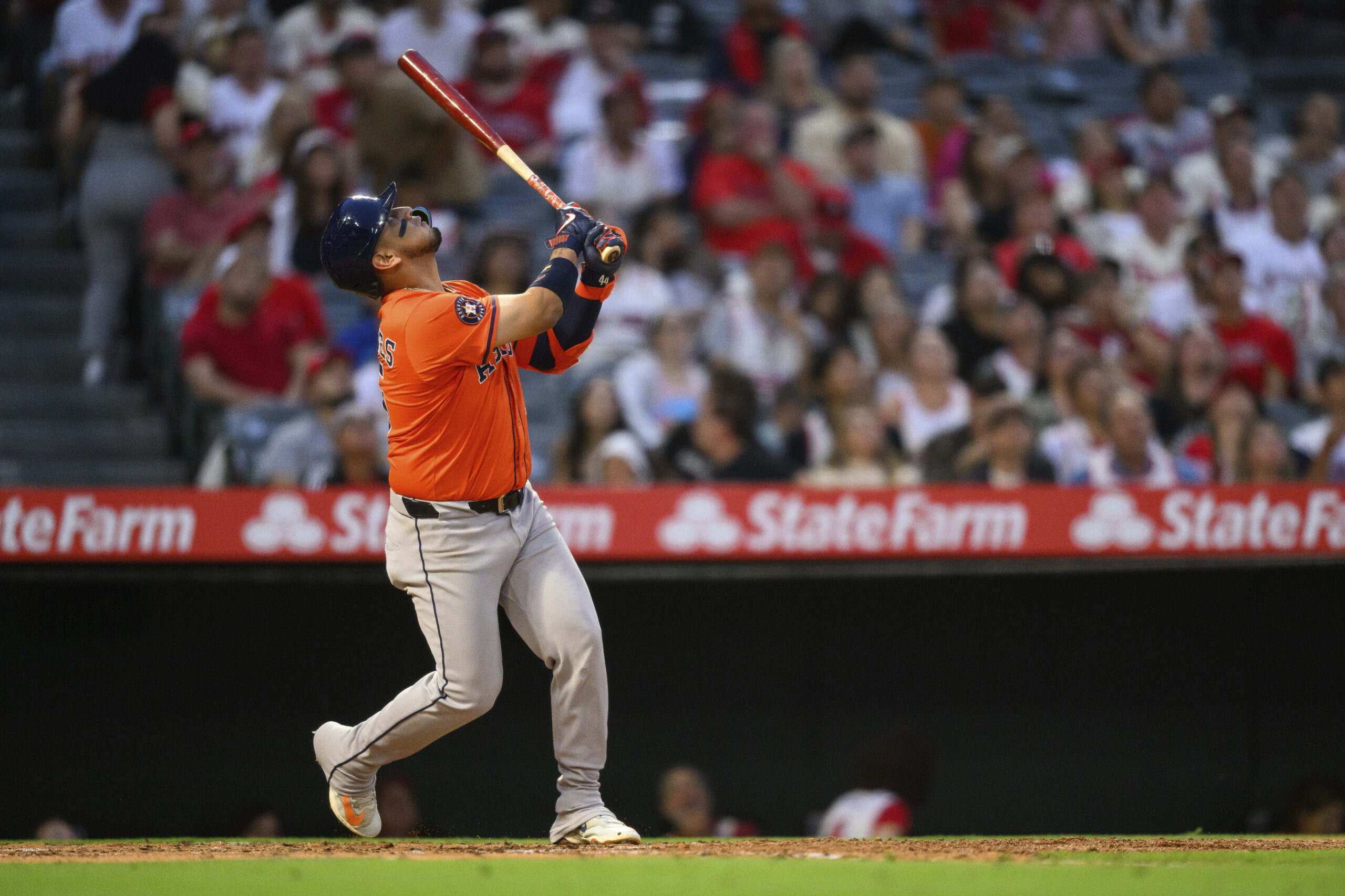 The Houston Astros’ Isaac Paredes watches his fly ball during...