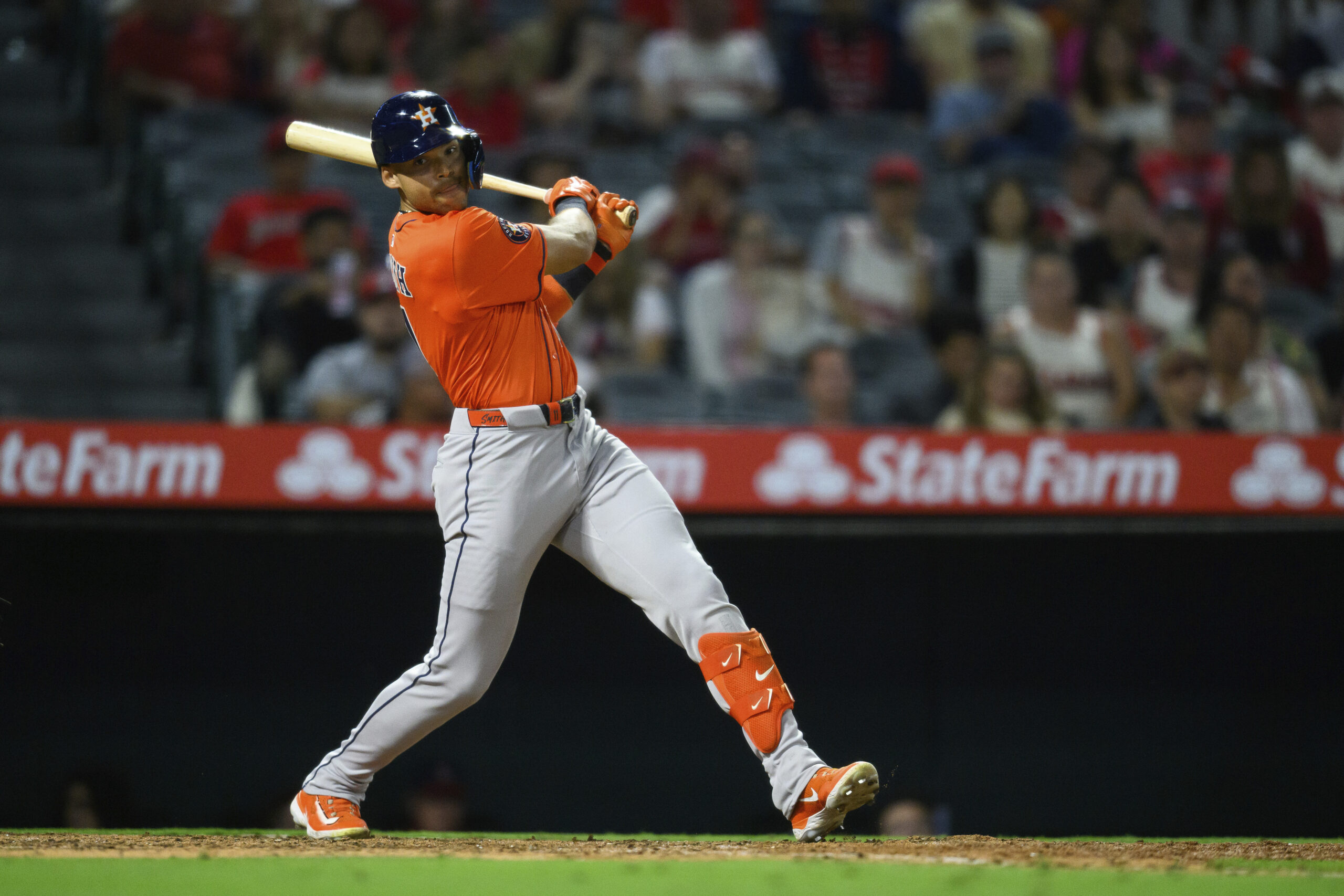 The Houston Astros’ Cam Smith swings for a foul ball...