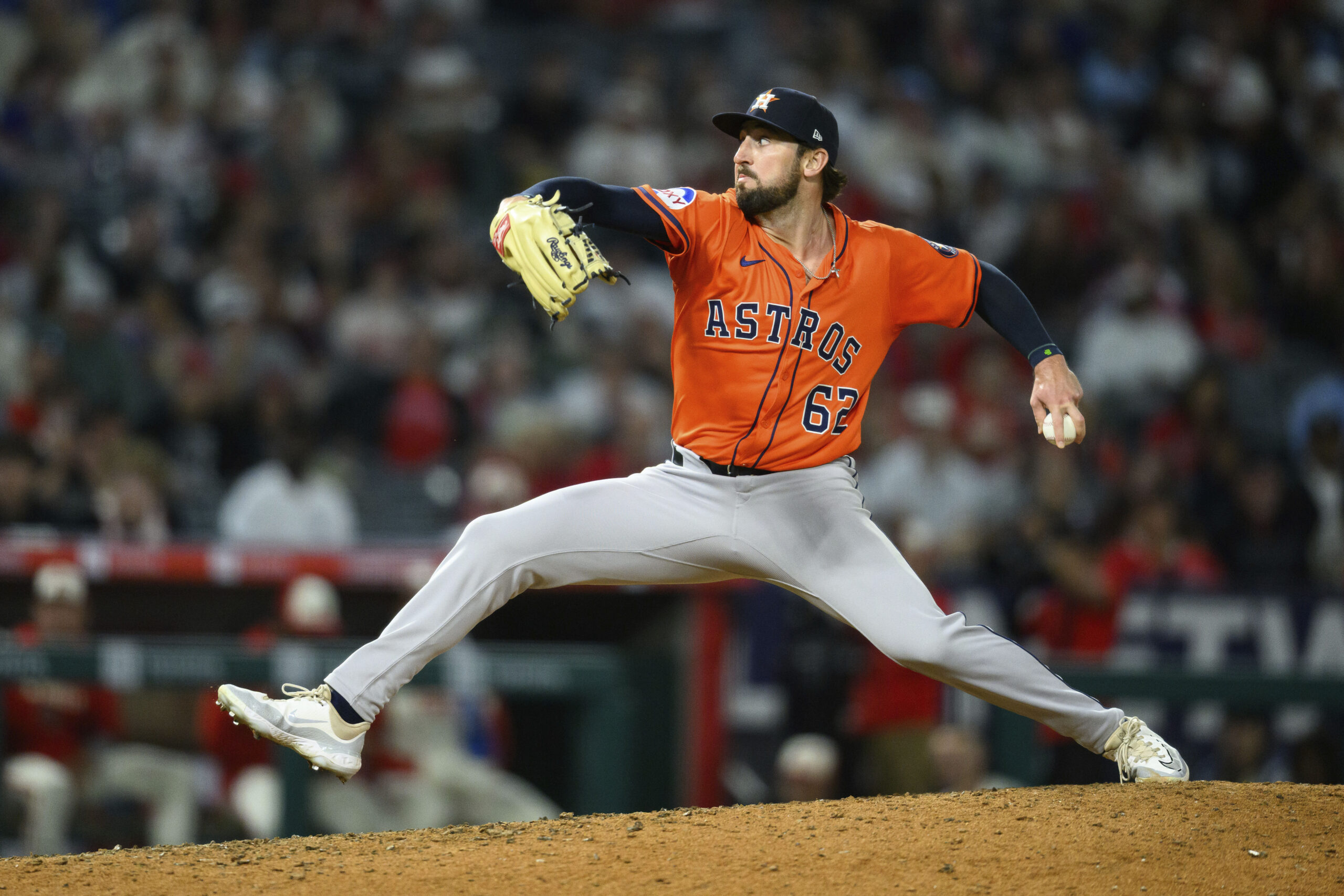 Houston Astros relief pitcher Bennett Sousa throws to the plate...