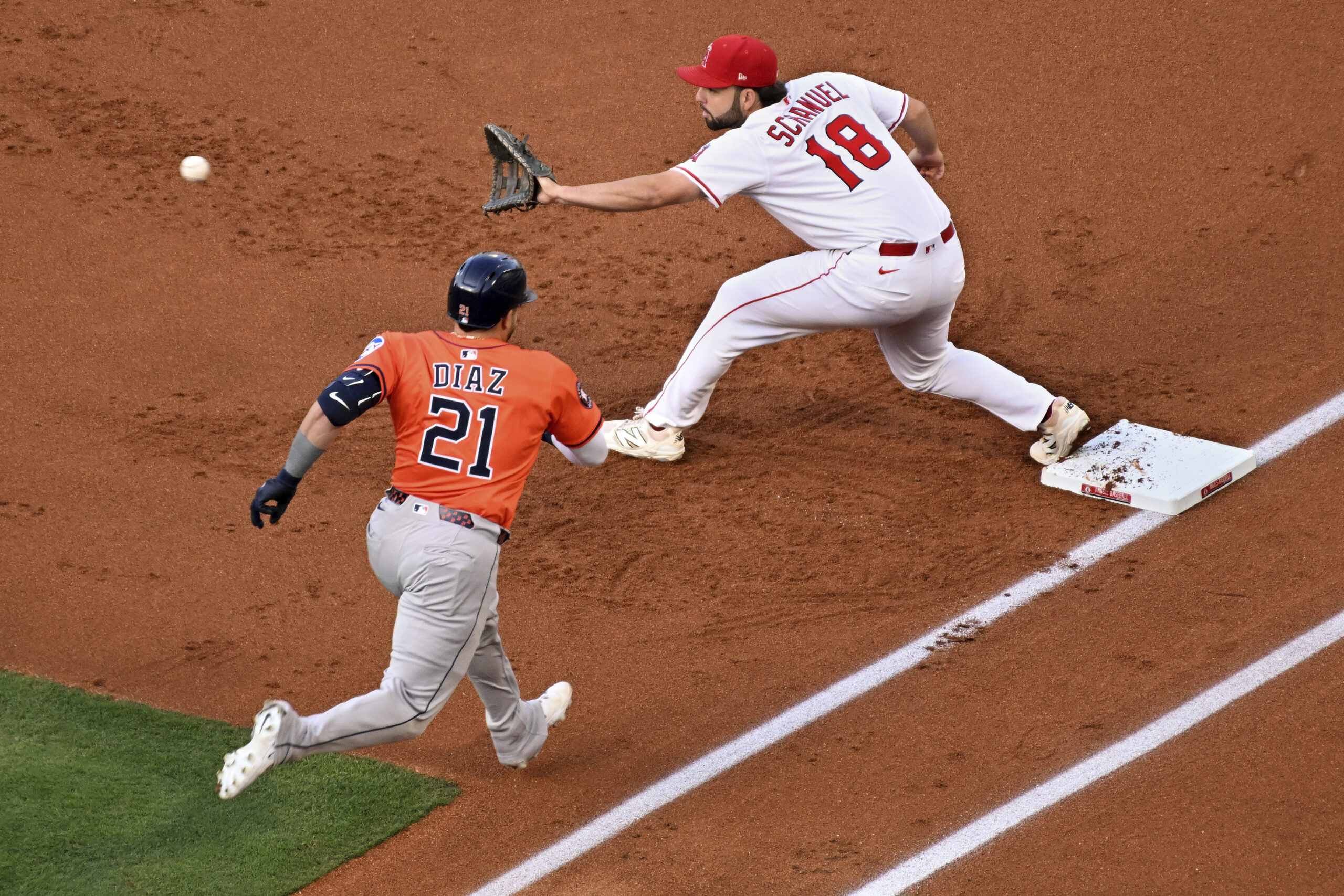 Angels first baseman Nolan Schanuel (18) forces out Houston Astros...