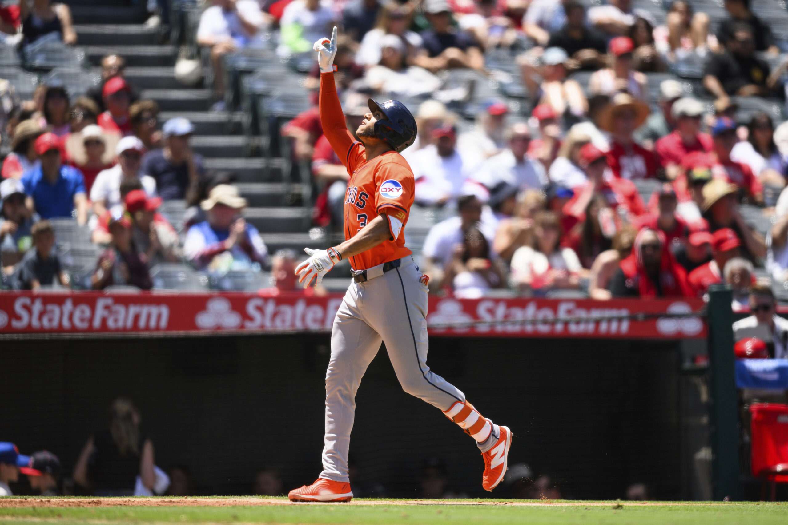 Houston Astros’ Jeremy Peña gestures after hitting a home run...