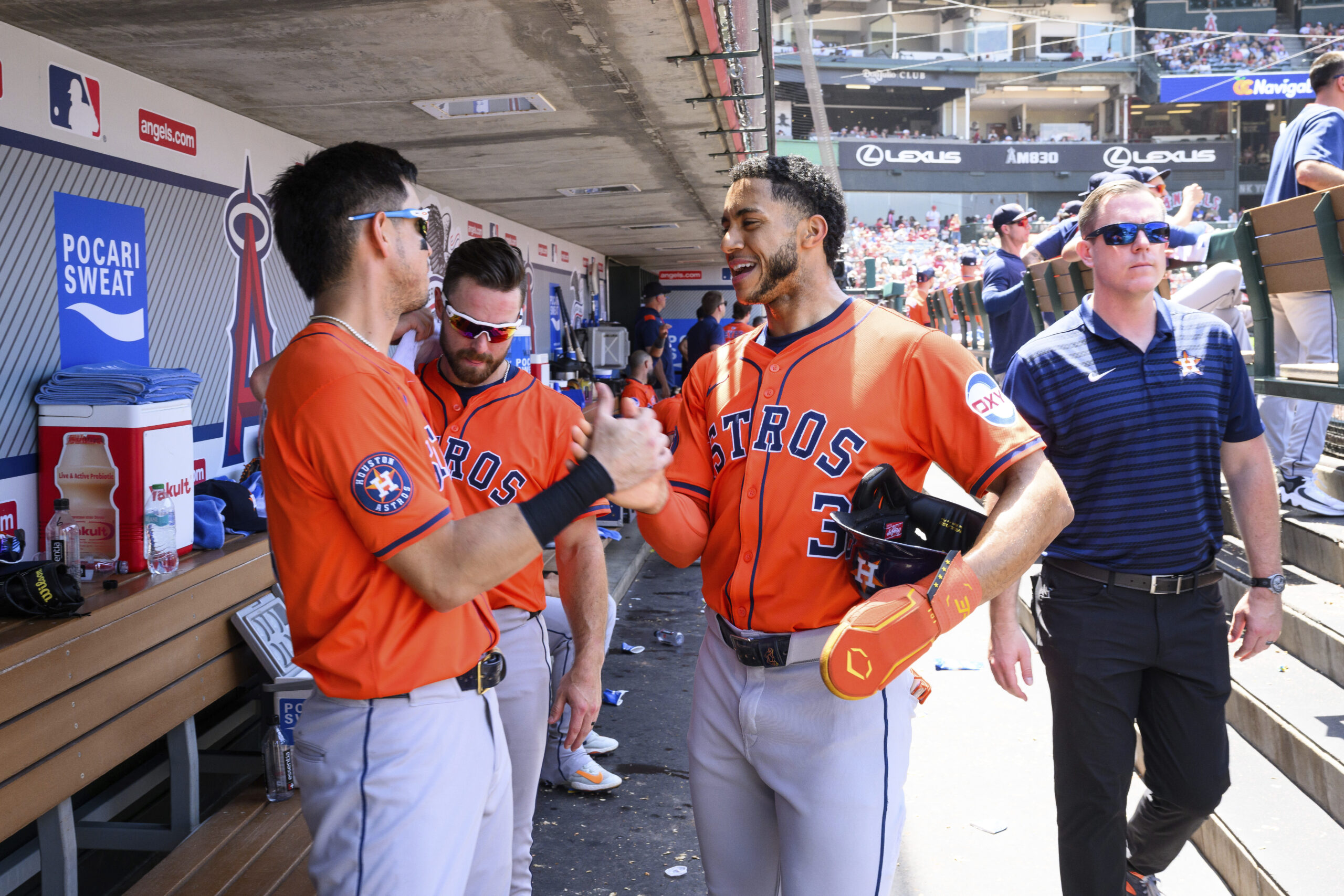 Houston Astros’ Jeremy Peña, right, celebrates with Mauricio Dubón after...
