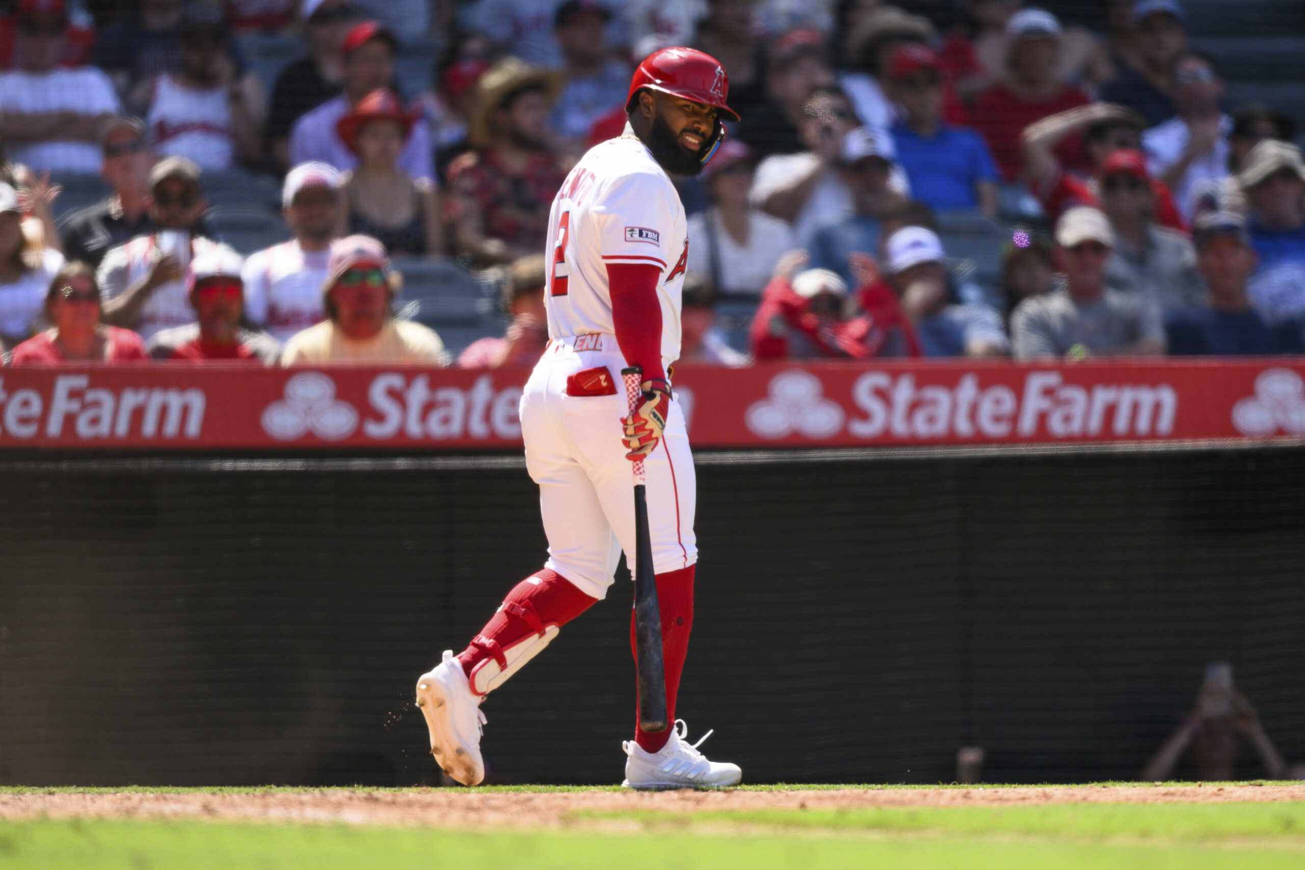 Angels’ Luis Rengifo reacts after striking out swinging during the...