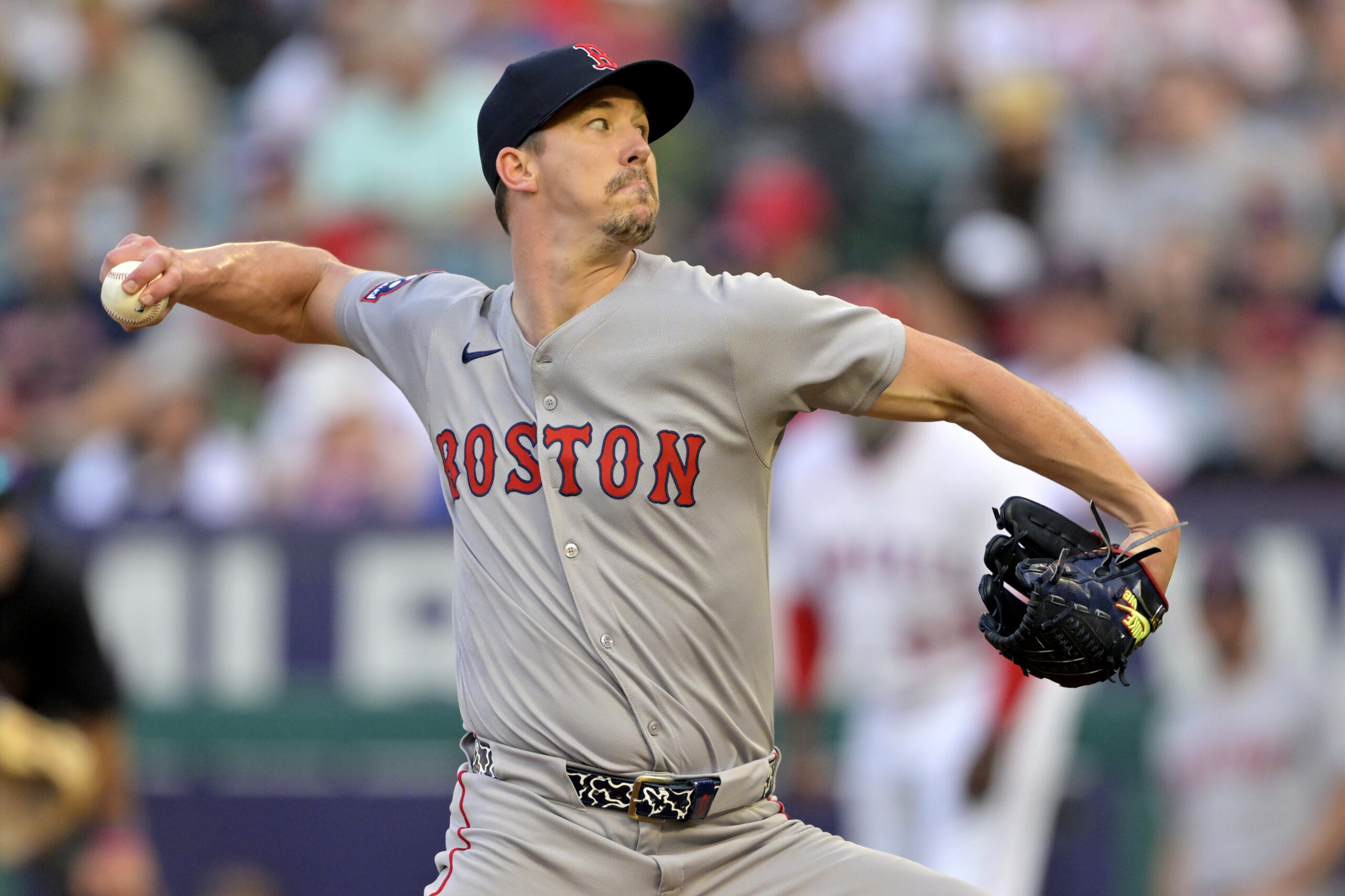 Boston Red Sox starting pitcher Walker Buehler throws to the...