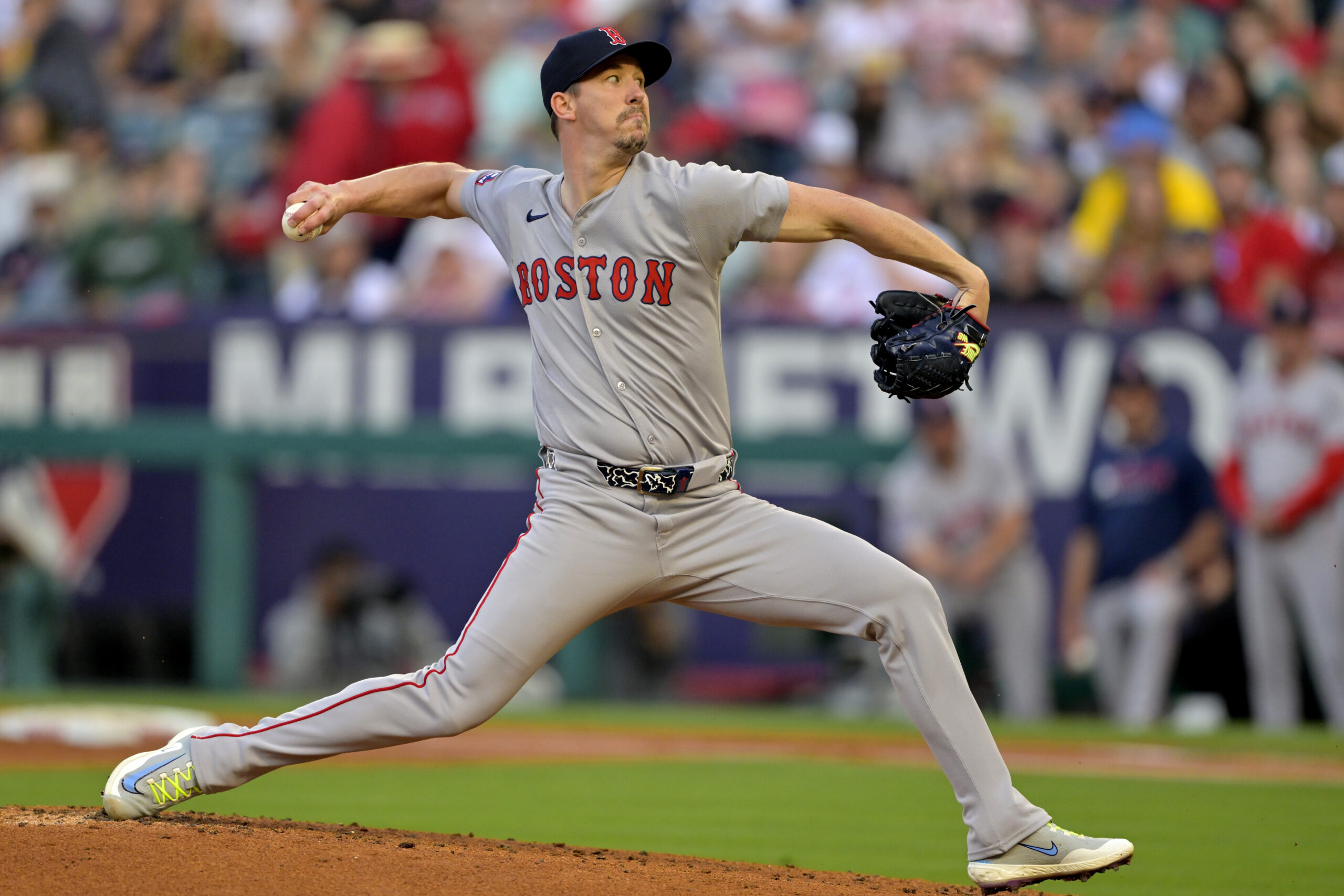 Boston Red Sox starting pitcher Walker Buehler throws to the...