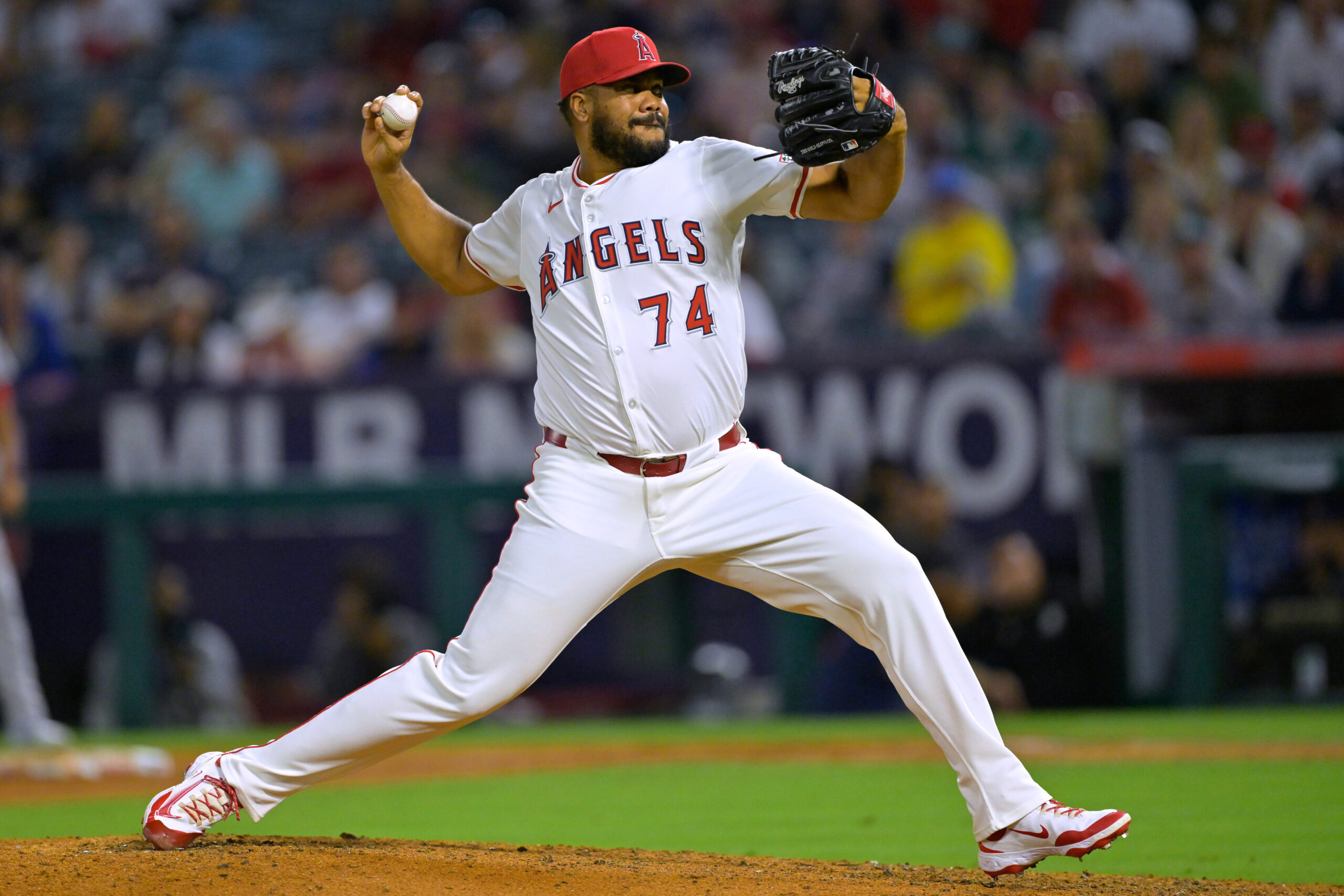 Angels relief pitcher Kenley Jansen throws to the plate during...