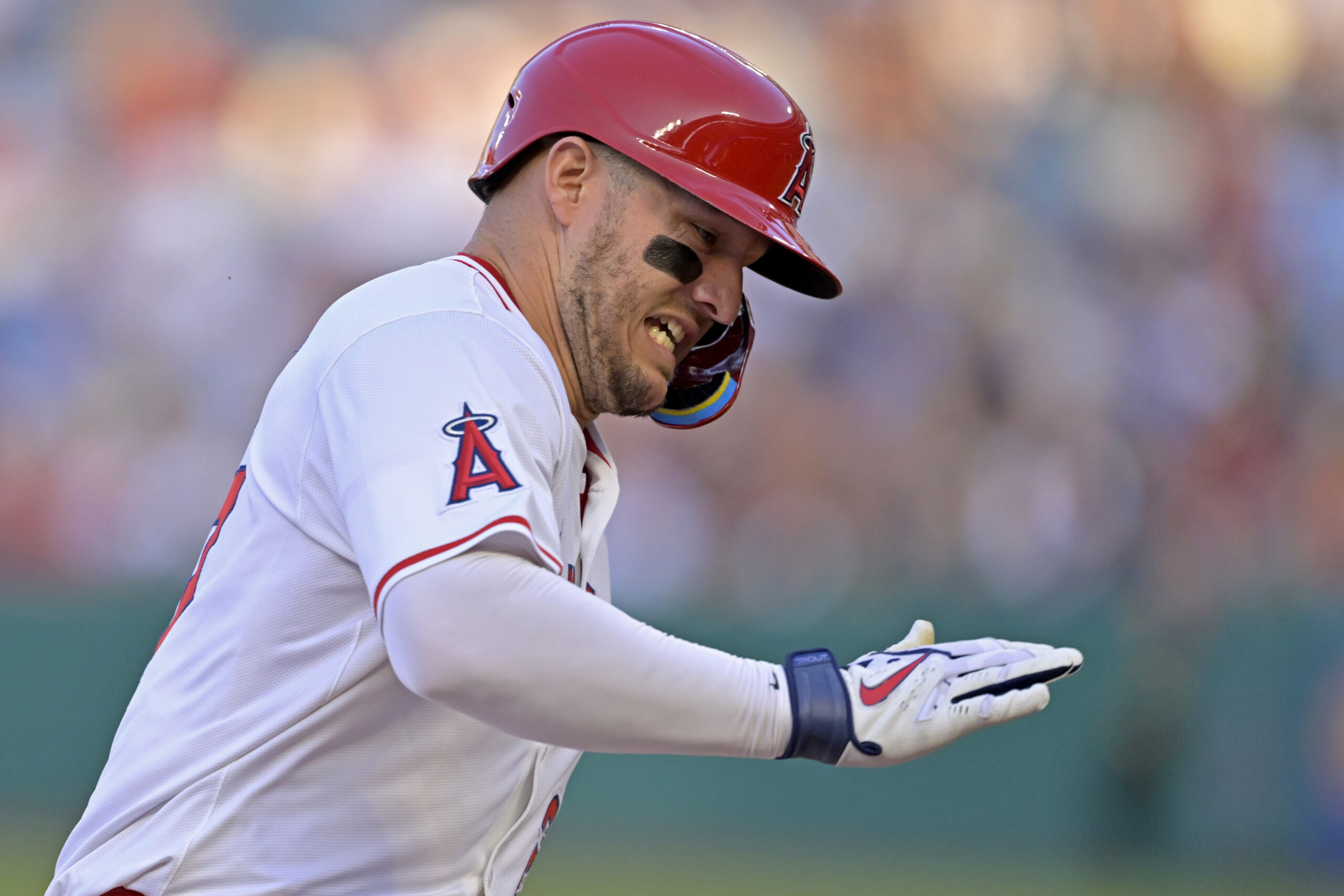 Angels star Mike Trout runs home to score a run...