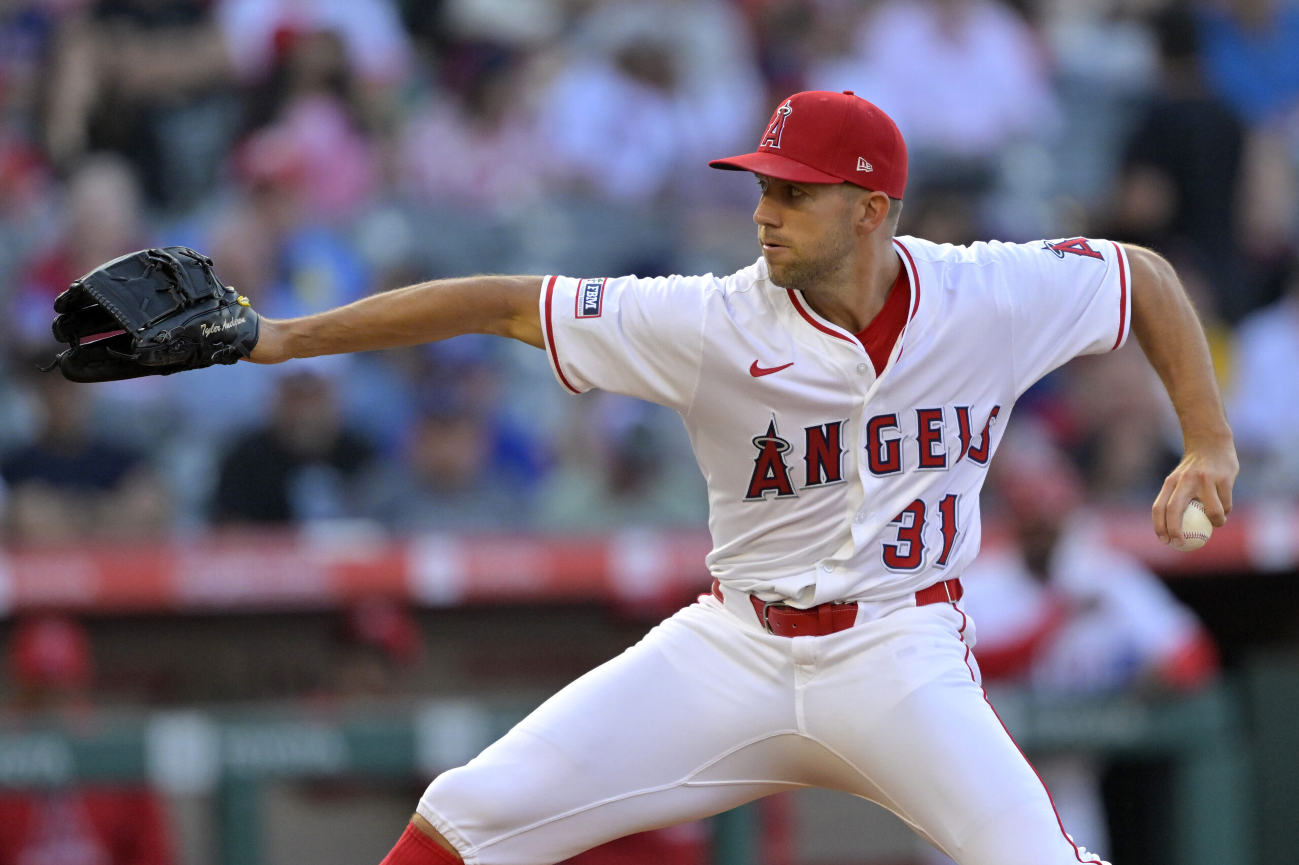 Angels starting pitcher Tyler Anderson throws to the plate during...
