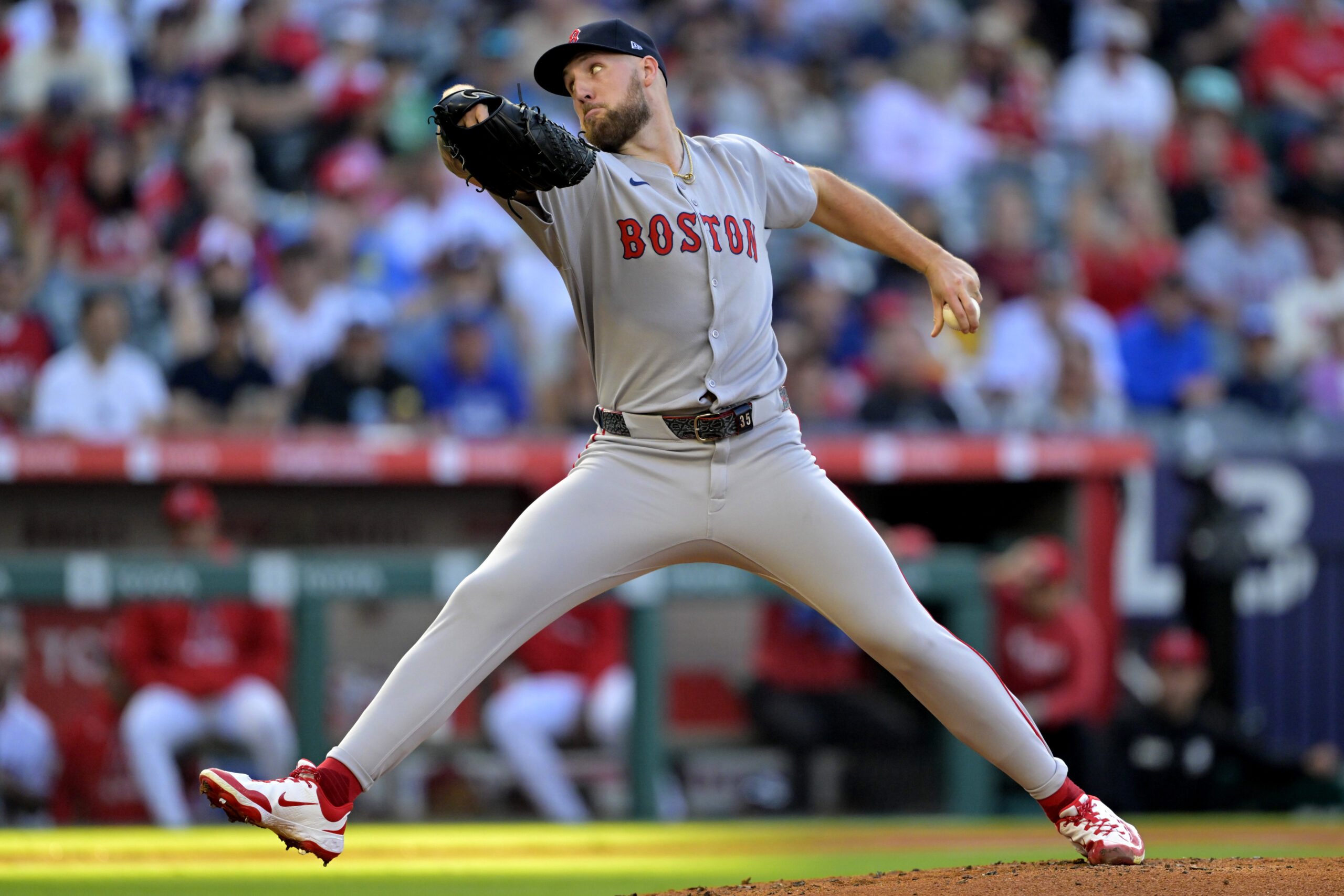 Boston Red Sox starting pitcher Garrett Crochet throws to the...