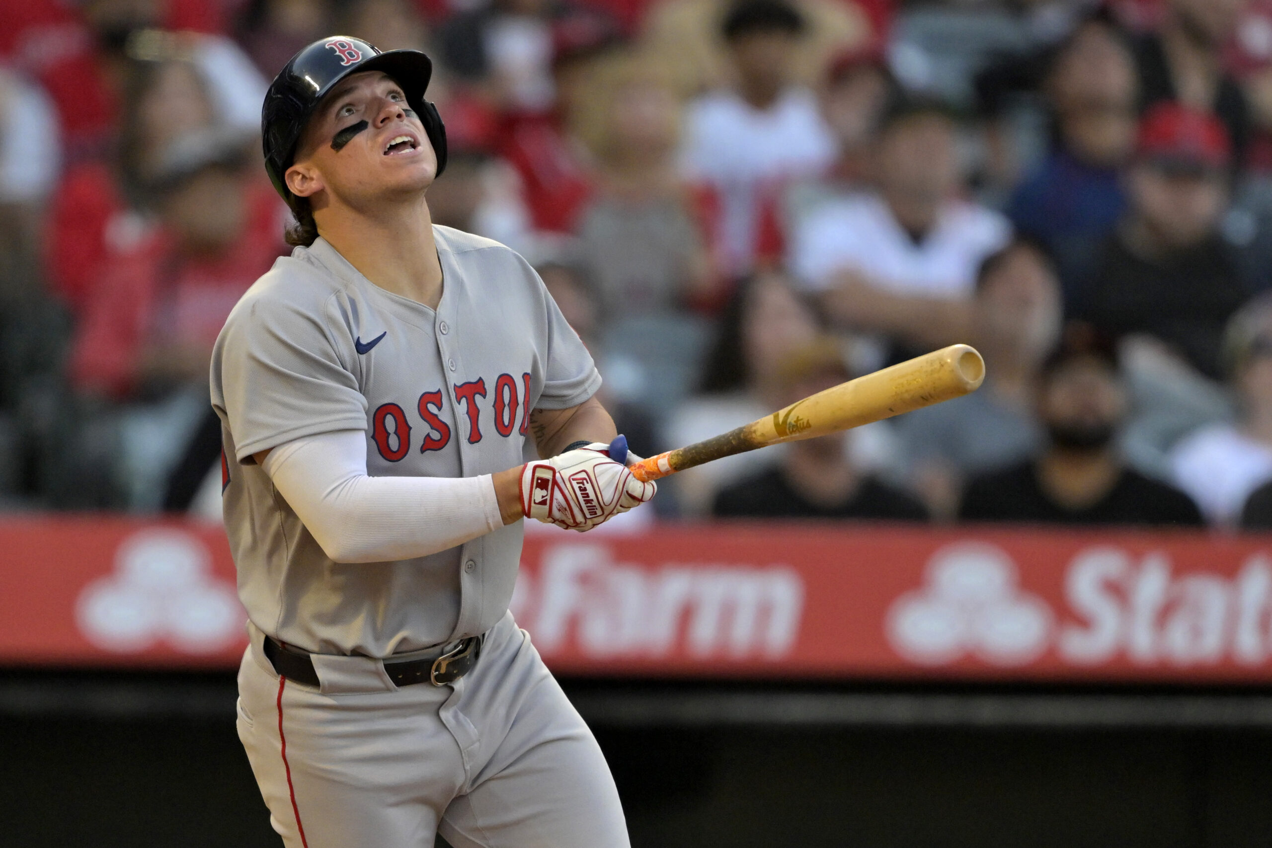 The Boston Red Sox’s Nate Eaton hits a sacrifice fly...