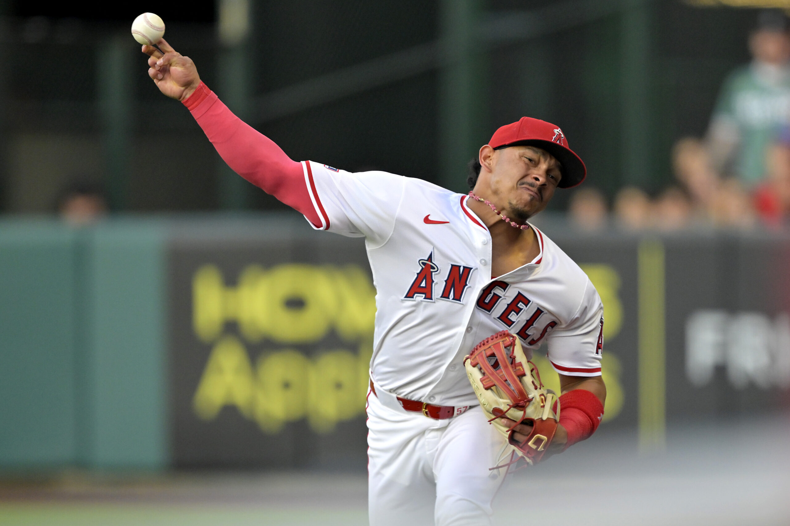 Angels first baseman LaMonte Wade Jr. makes a throw to...