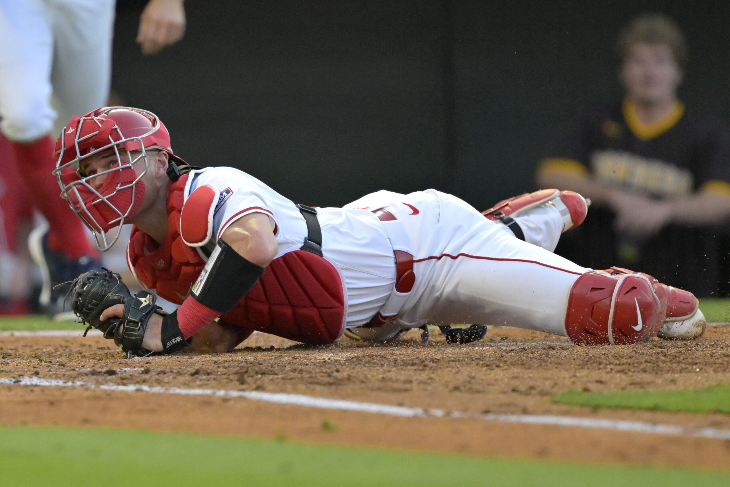 Angels catcher Logan O’Hoppe looks for the umpire’s call during...