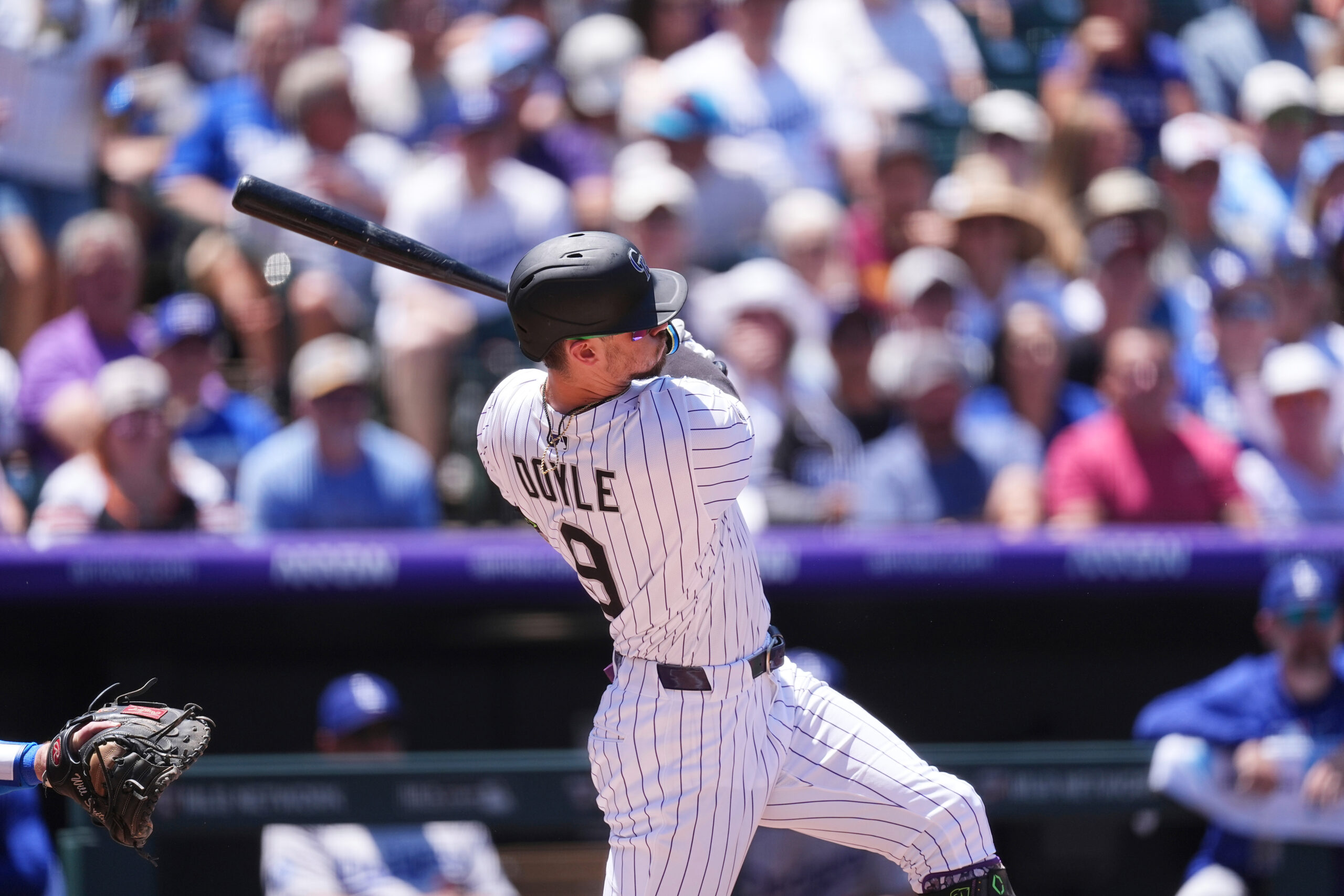 The Colorado Rockies’ Brenton Doyle hits a solo home run...