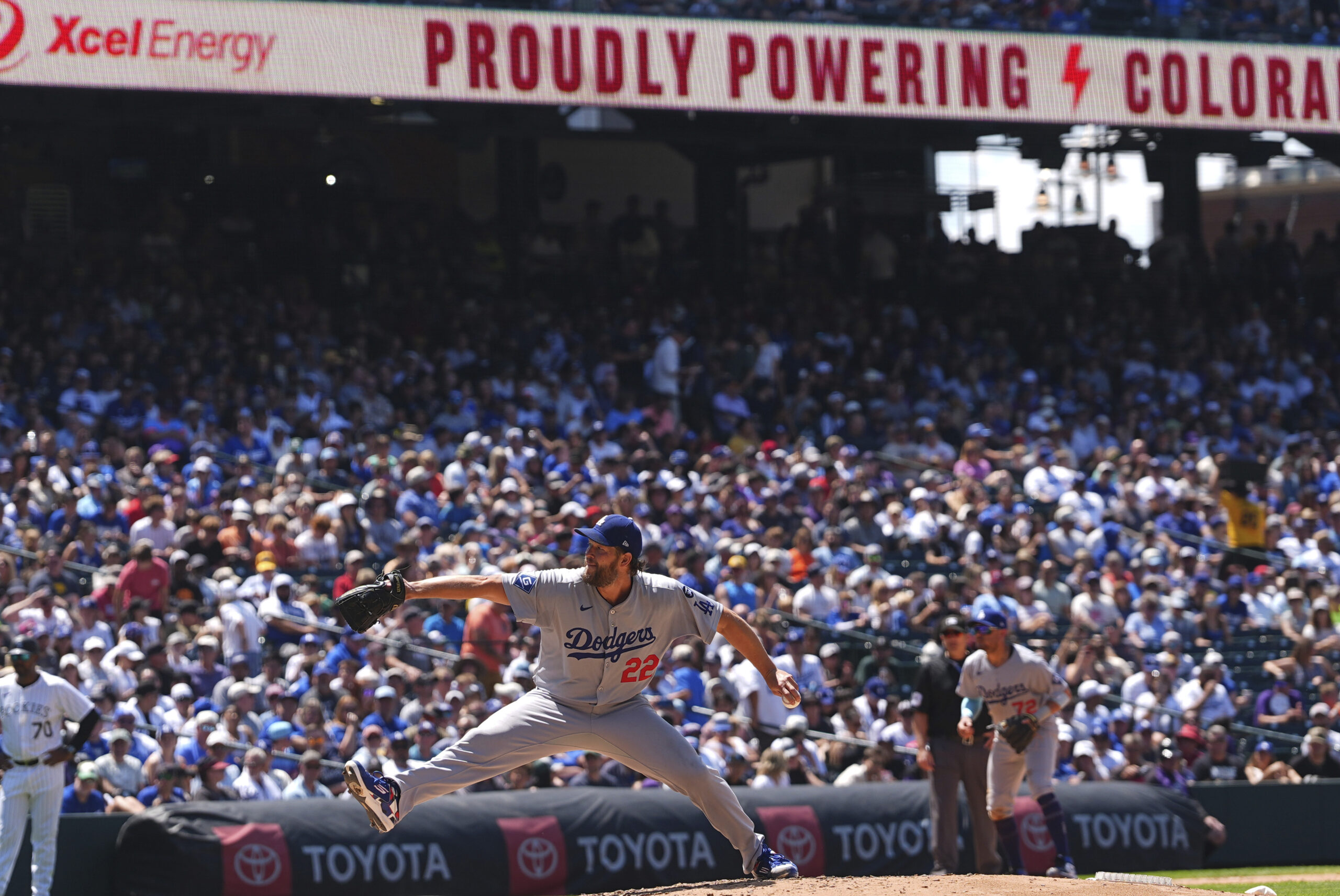 Dodgers starting pitcher Clayton Kershaw throws to the plate during...
