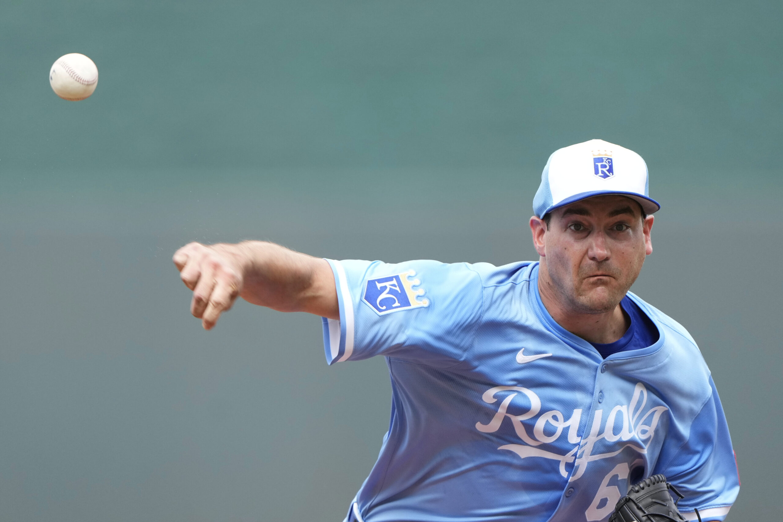 Kansas City Royals starting pitcher Seth Lugo throws during the...