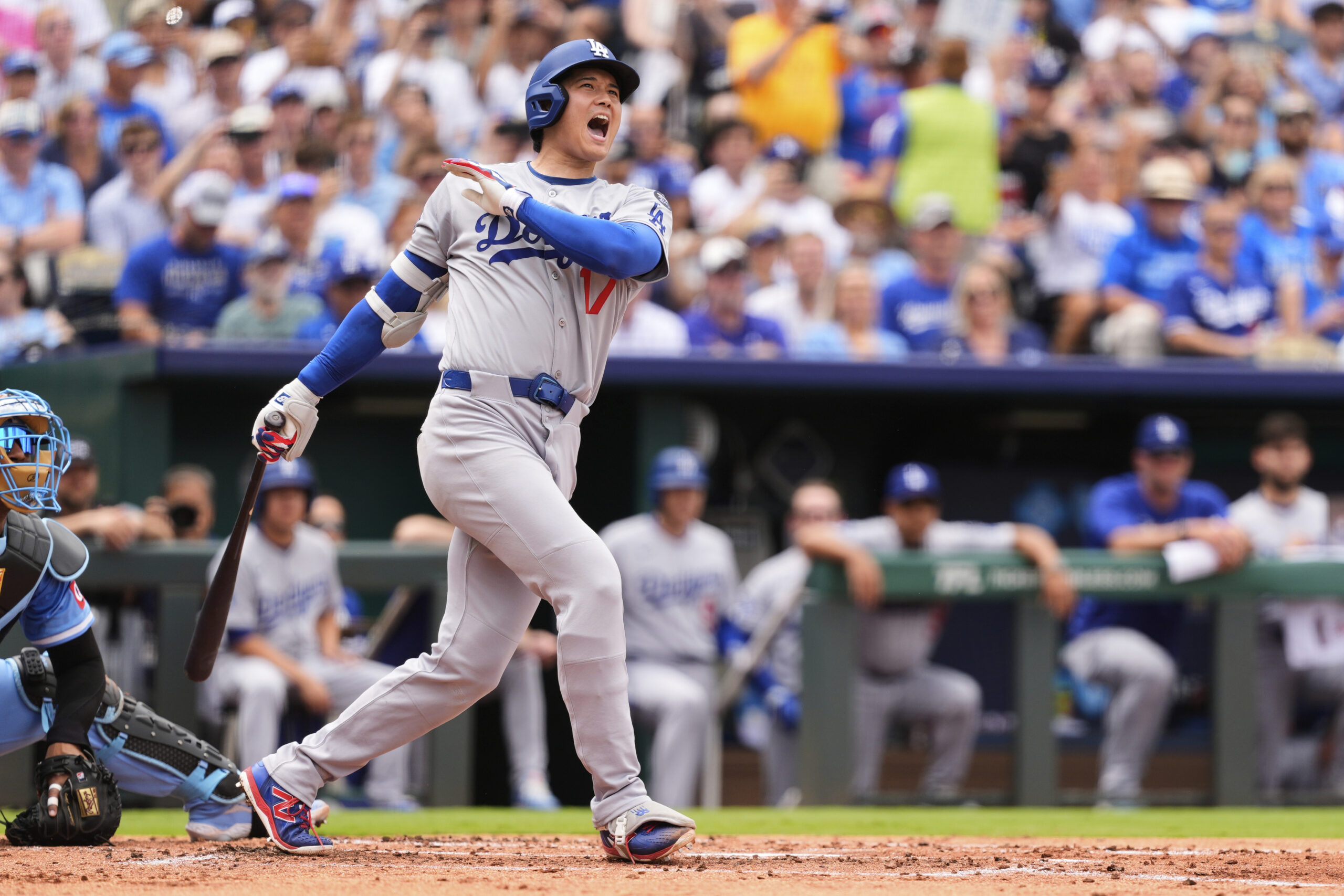 Dodgers’ Shohei Ohtani watches his foul ball during the third...