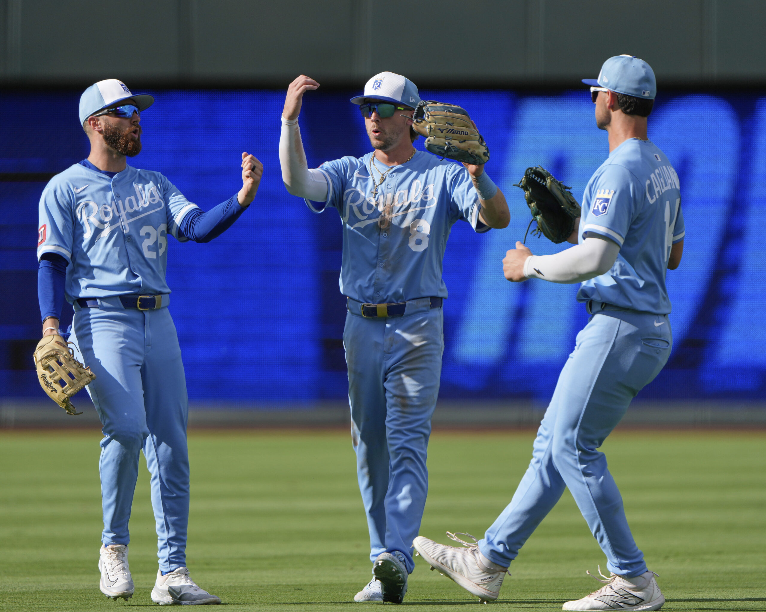 Kansas City Royals outfielders John Rave (26), Drew Waters (8)...