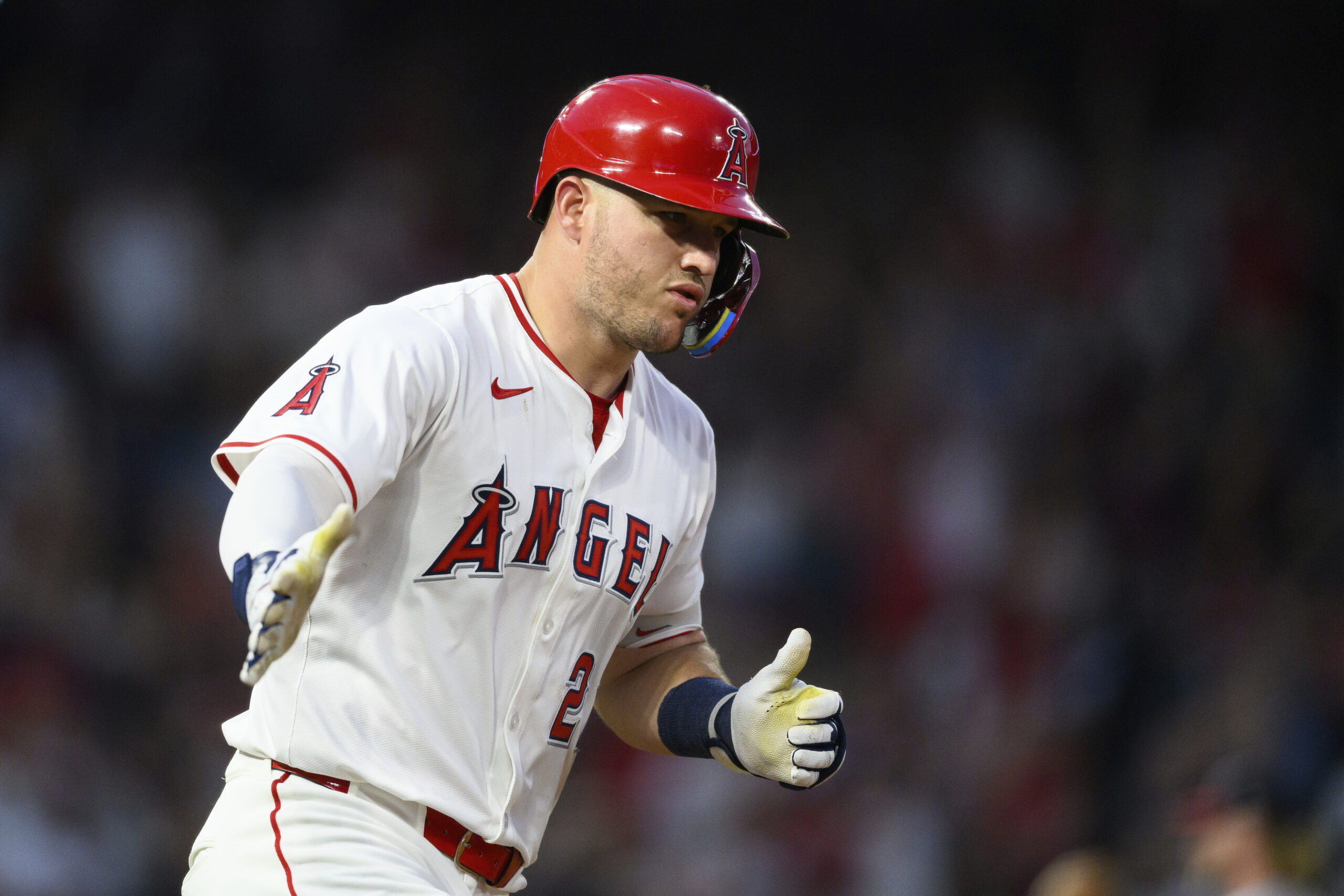 Angels’ Mike Trout runs after hitting a home run during...