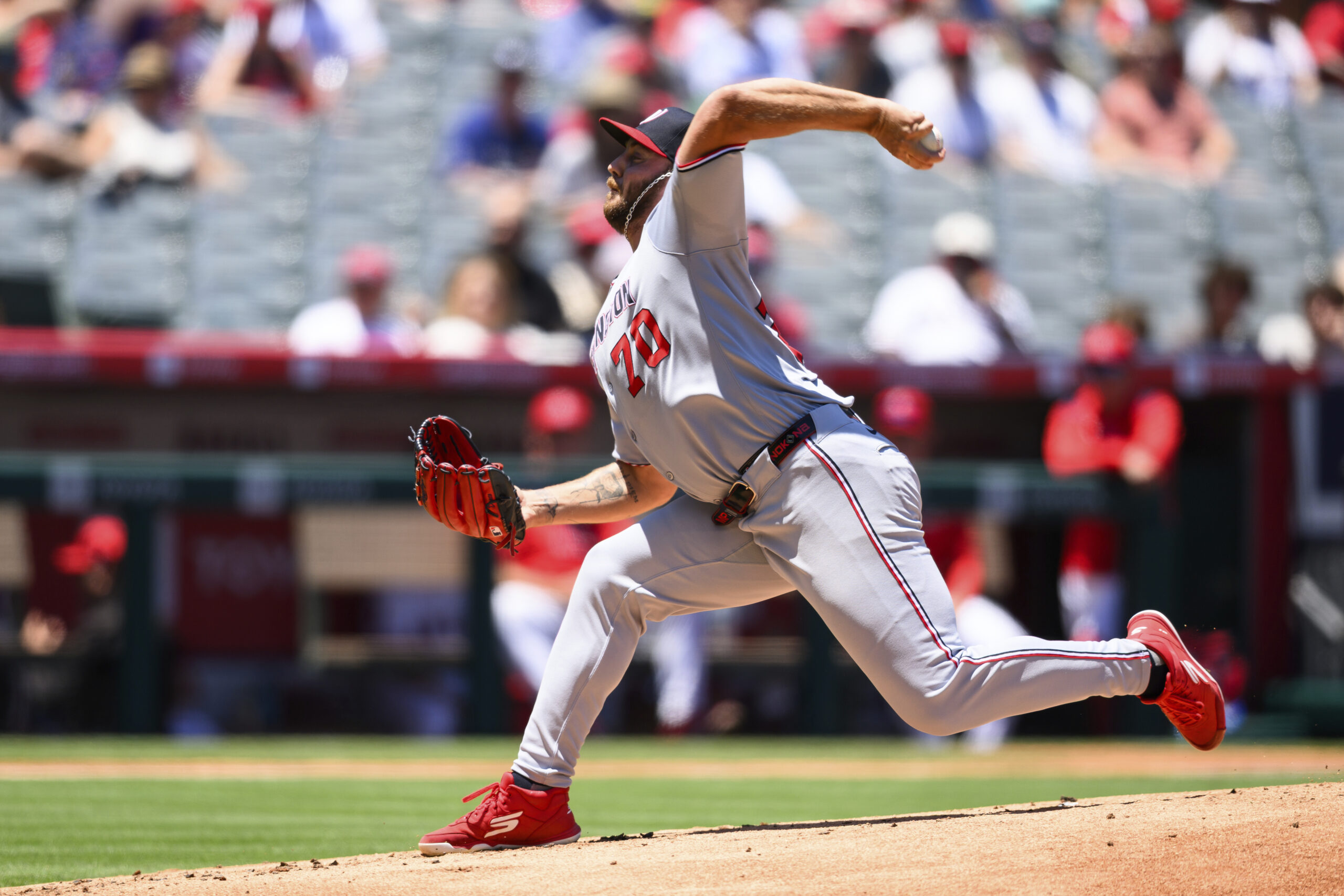 Washington Nationals pitcher Mitchell Parker delivers during the first inning...