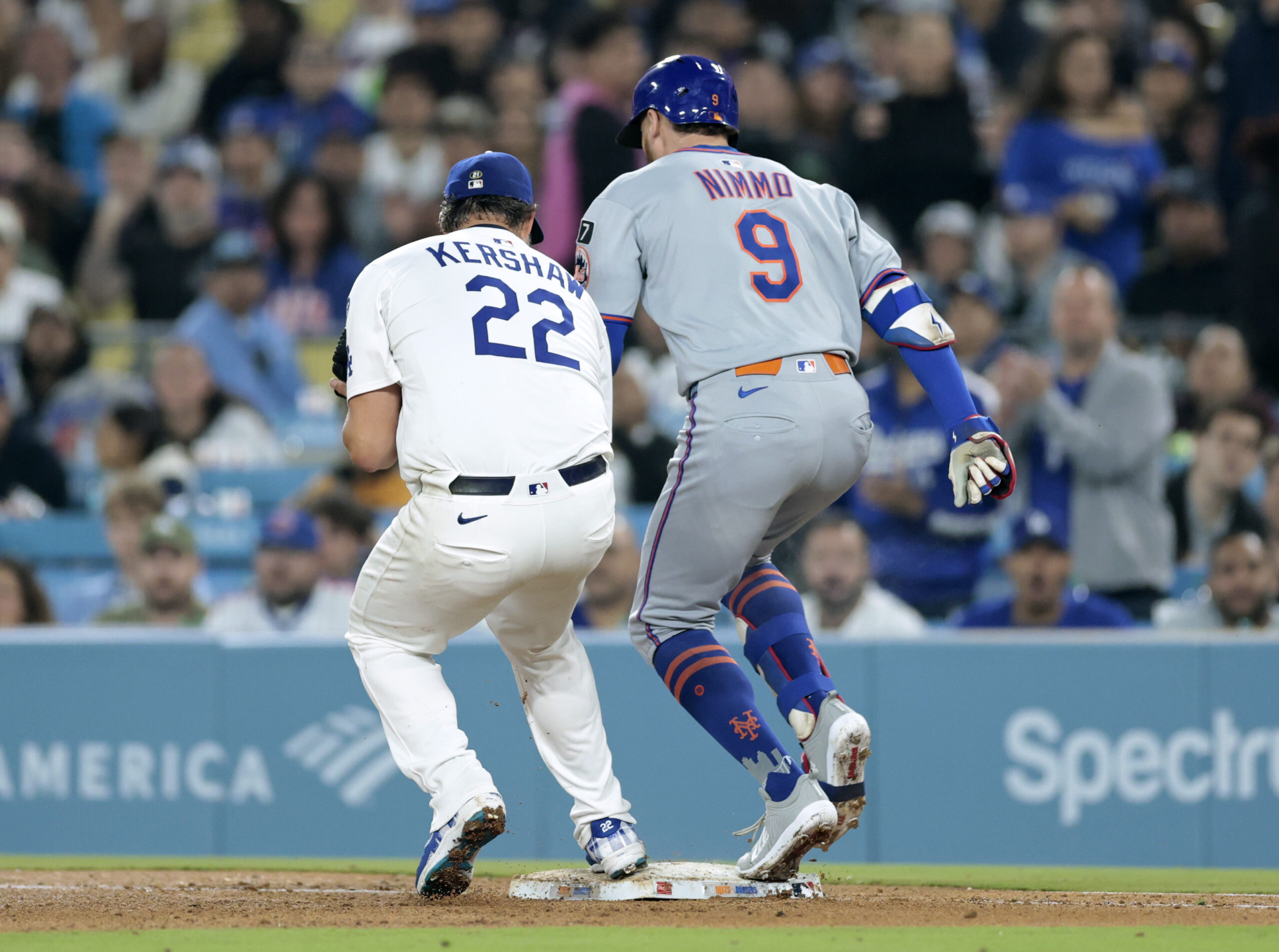 The New York Mets’ Brandon Nimmo beats Dodgers starting pitcher...