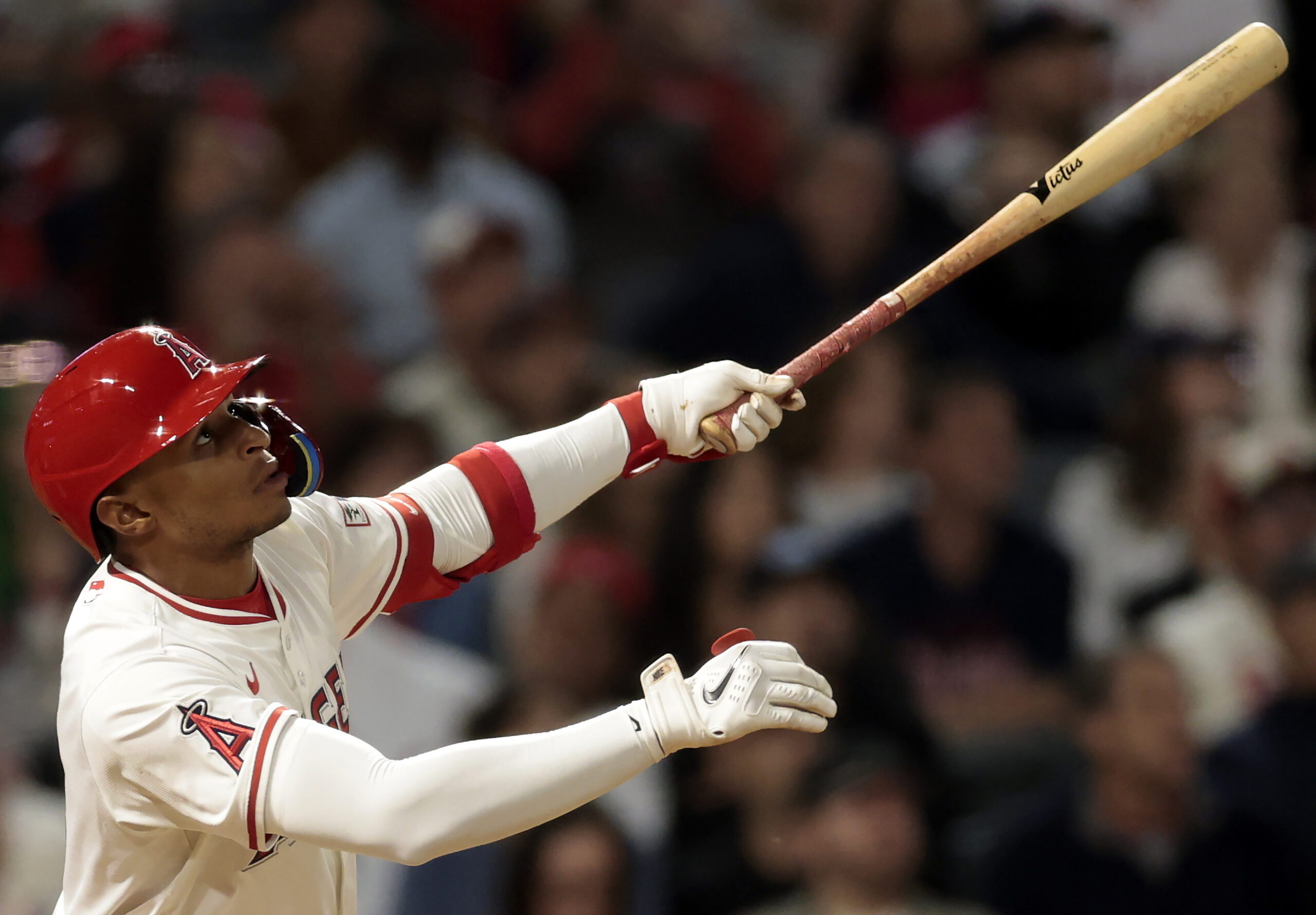 The Angels’ Christian Moore hits a sacrifice fly to score...